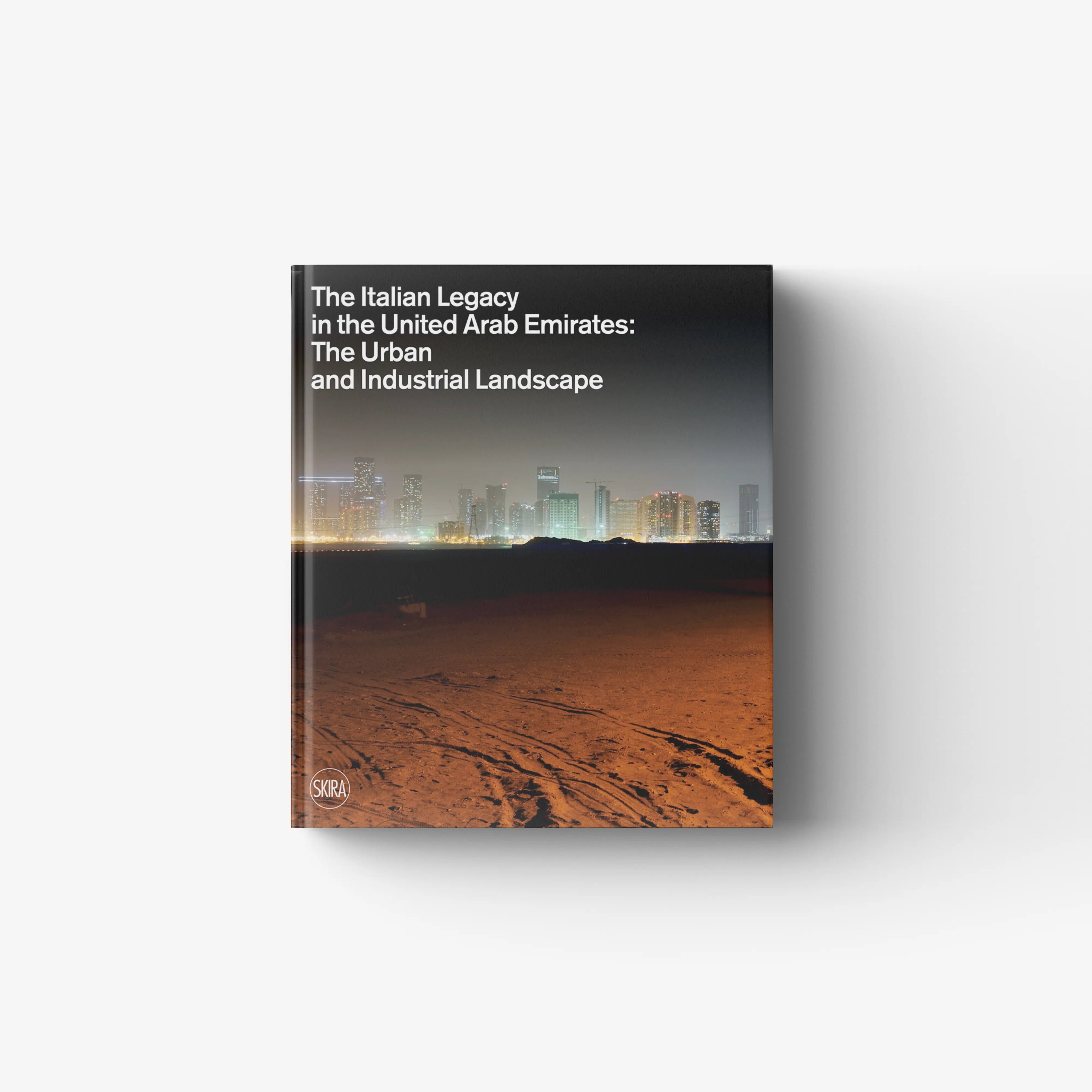 Book cover featuring a twilight city skyline above an orange desert foreground with text in white font.