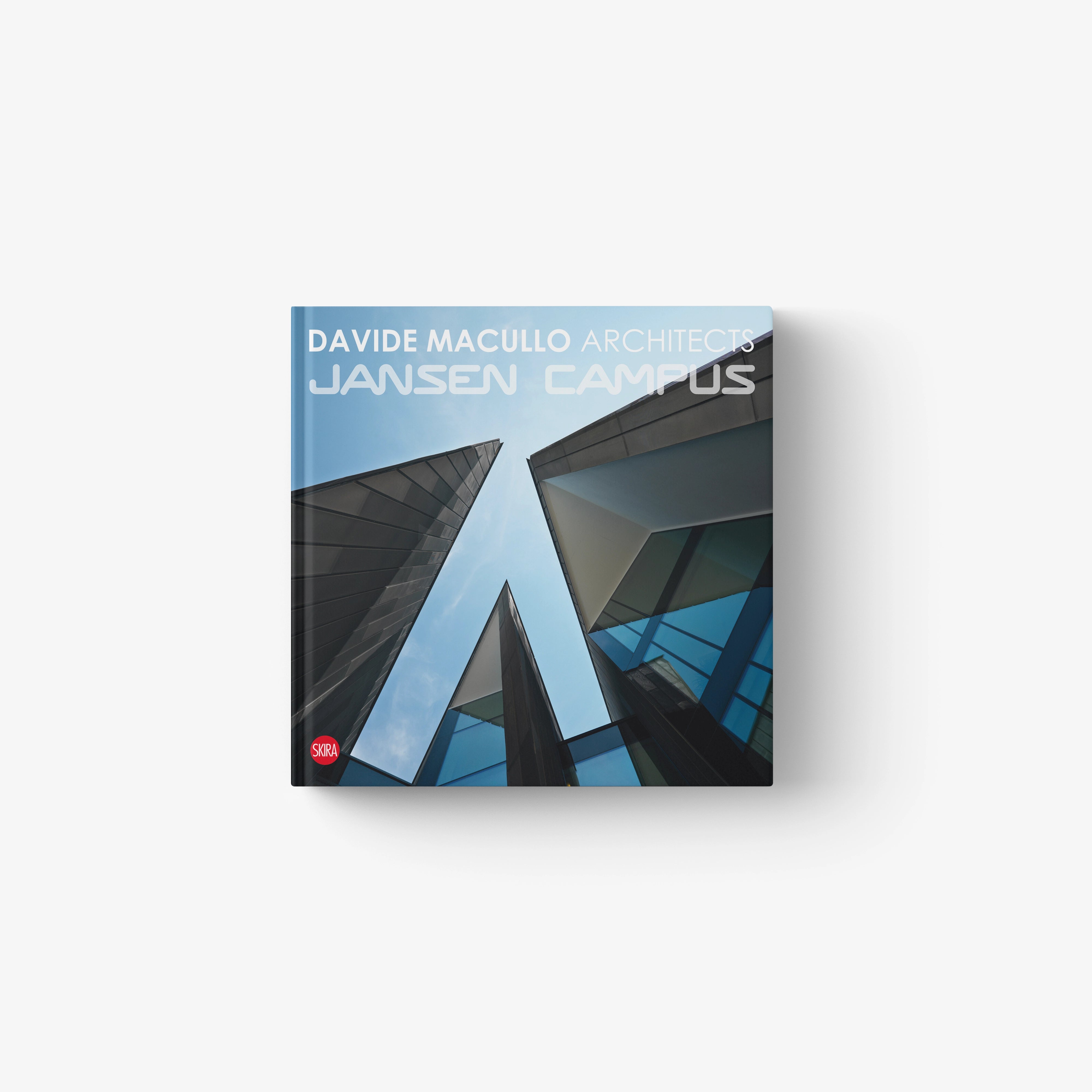 Architectural book cover with blue sky and dark angular campus buildings