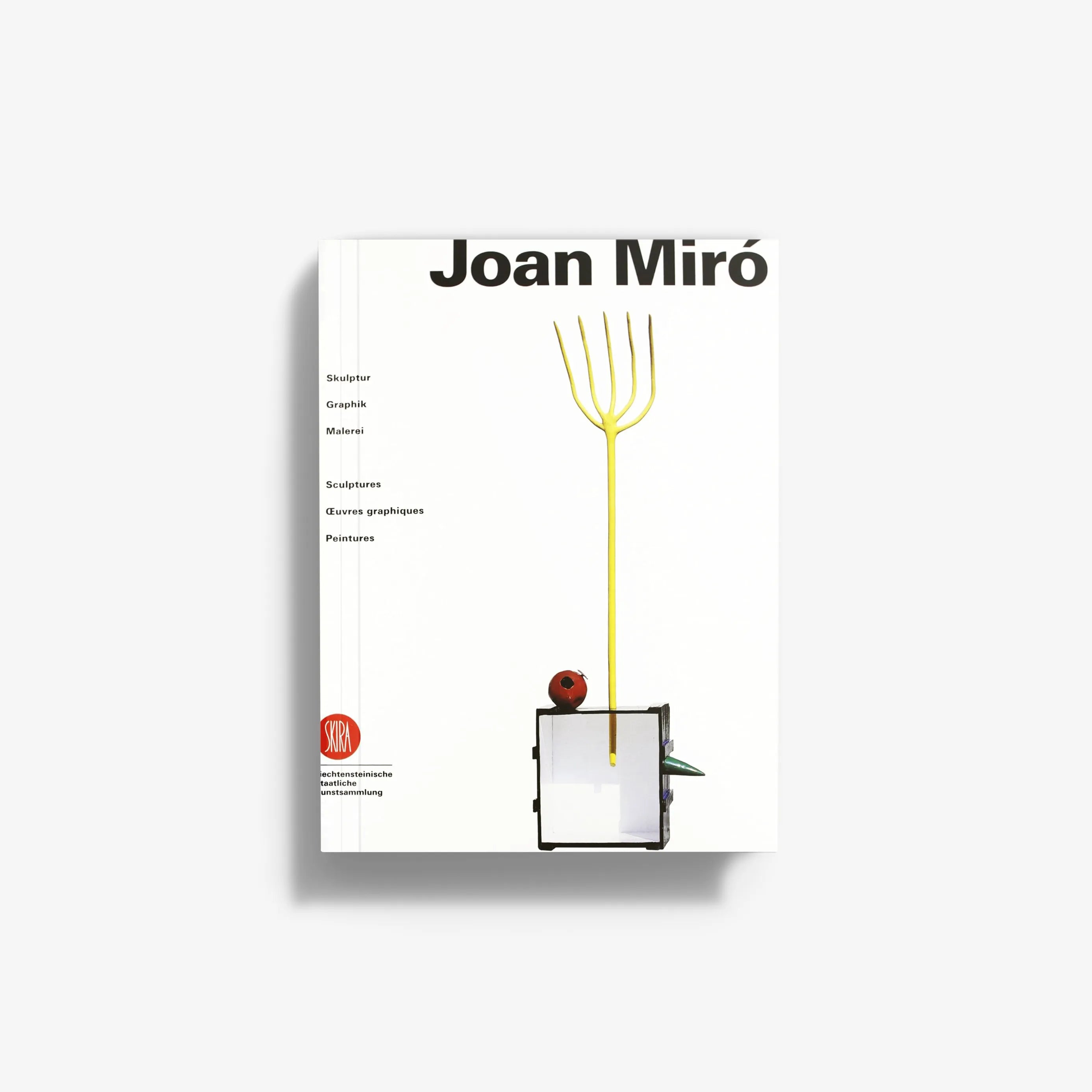 Joan Miró art book with white cover, black title, yellow line drawing, and abstract object.