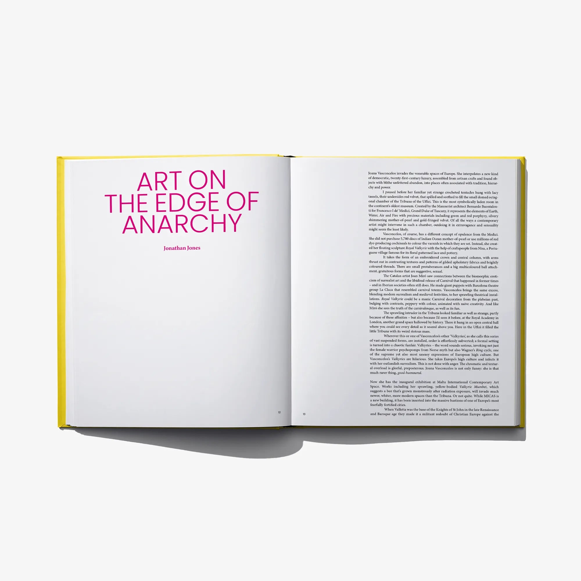 Open art book showing left title panel and right column of printed text.