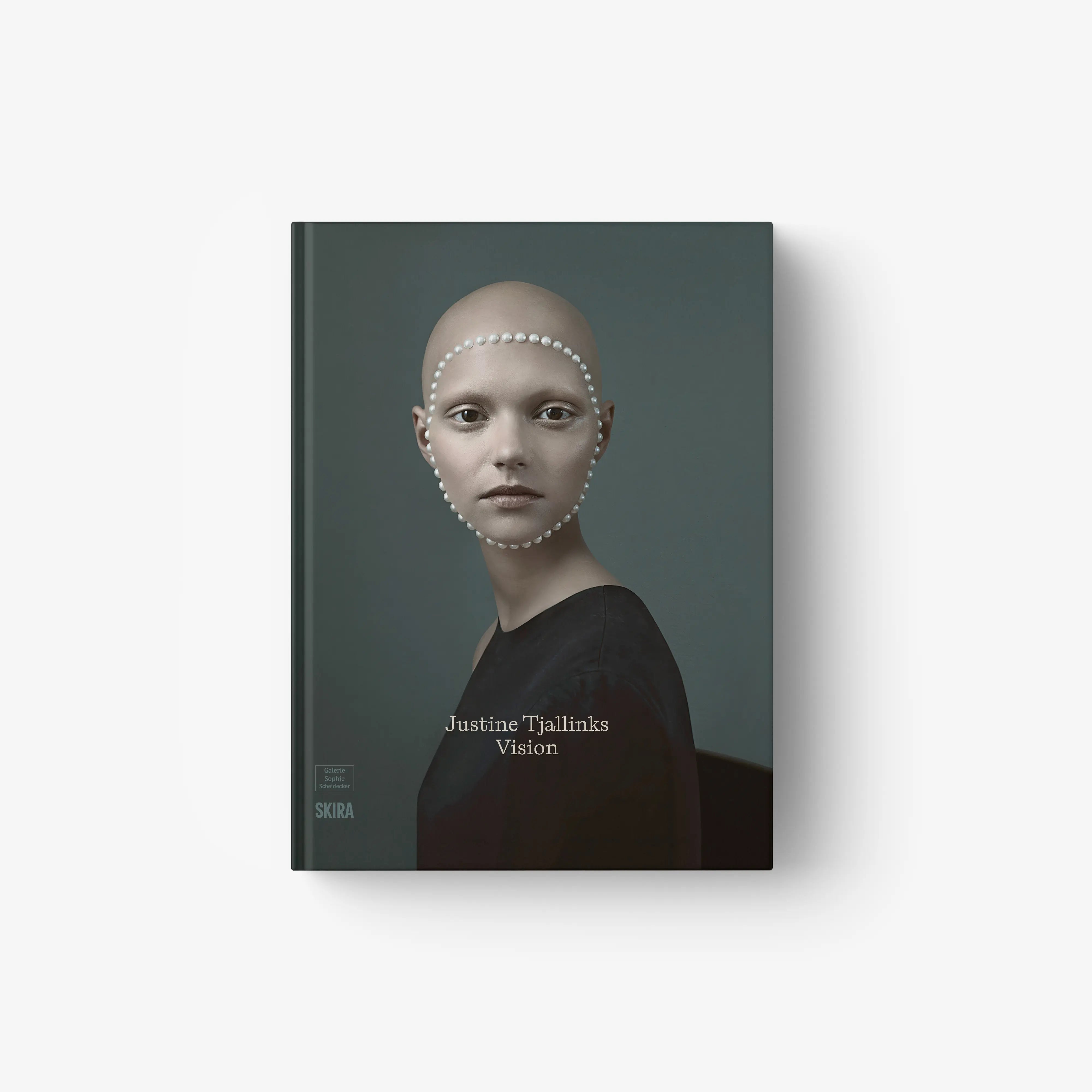 Hardcover art book cover with a woman's portrait and pearl-studded headpiece