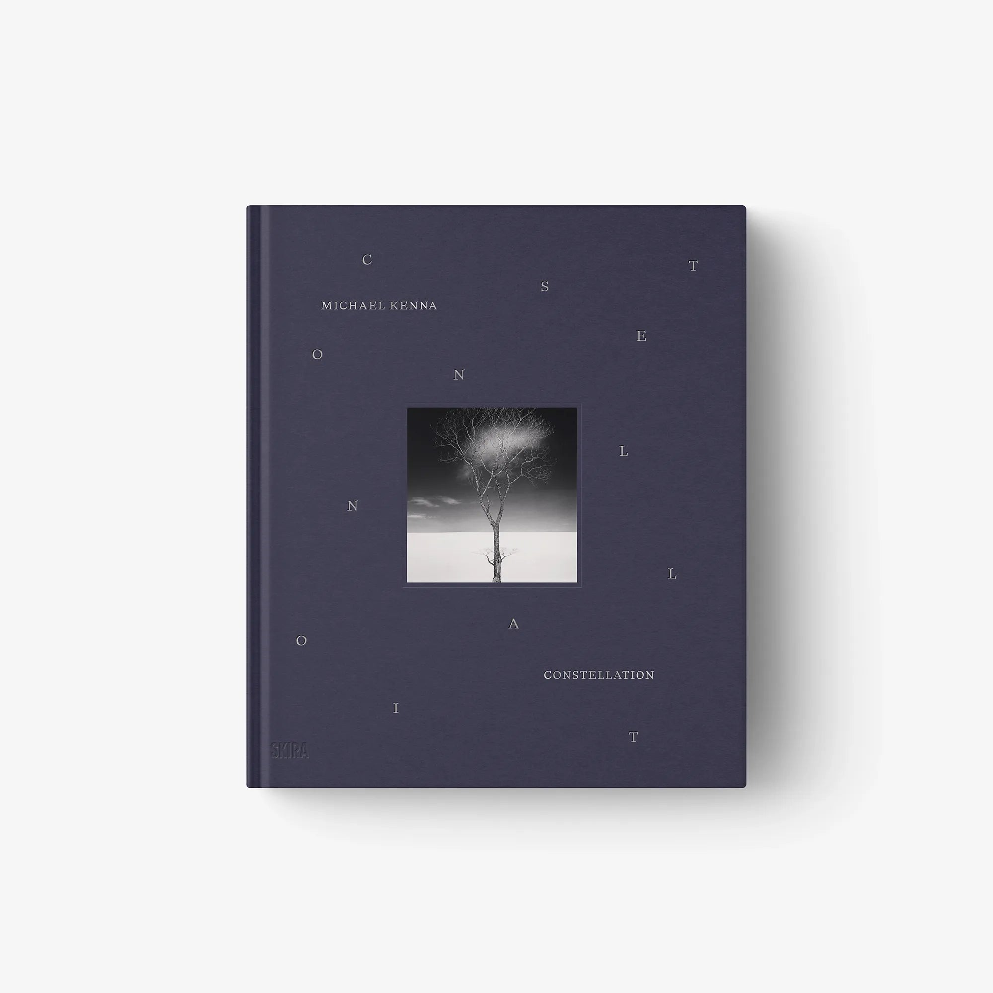Hardcover book “Constellation” by Michael Kenna, dark blue cover with central photo.