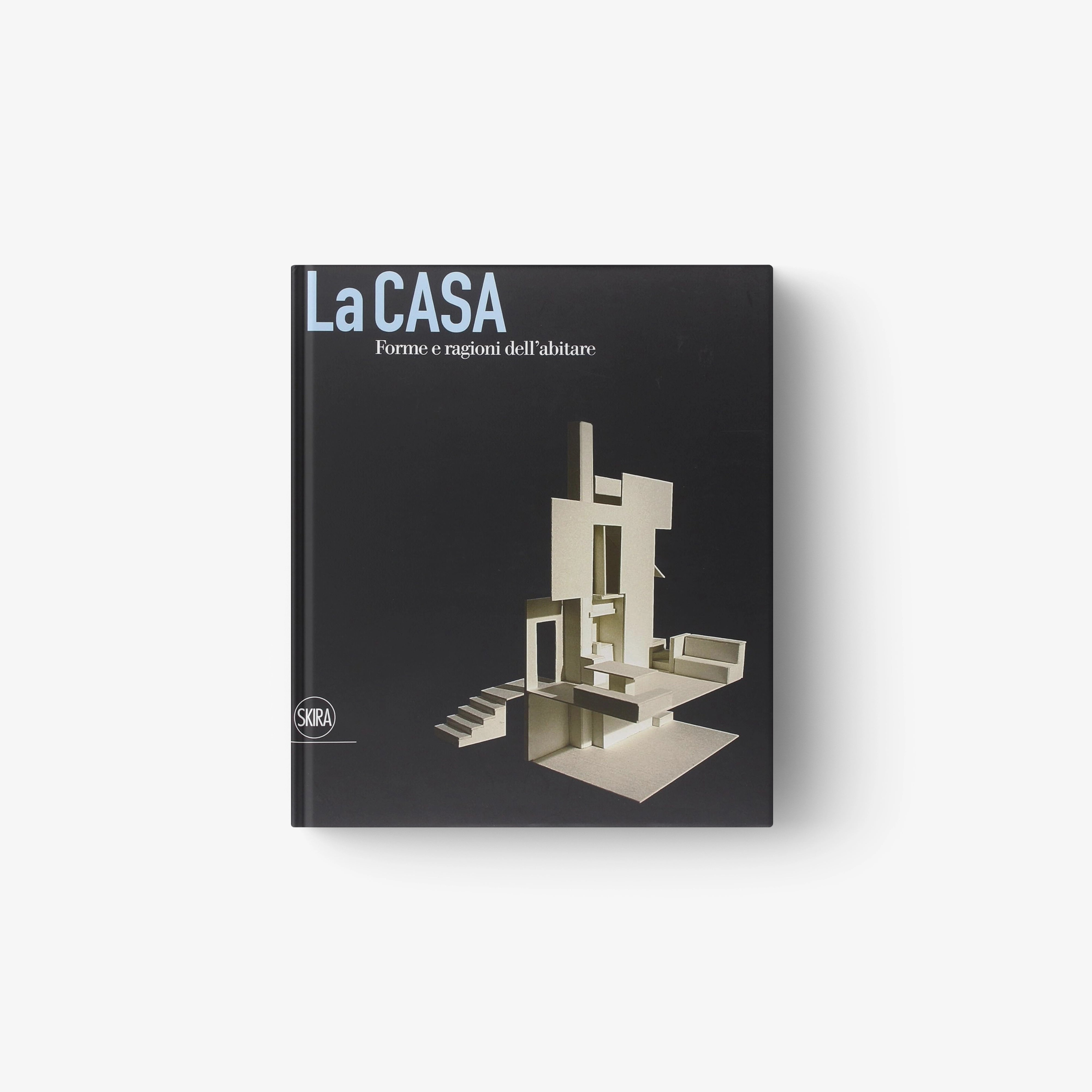 Architecture book with black cover, La CASA title, abstract building illustration