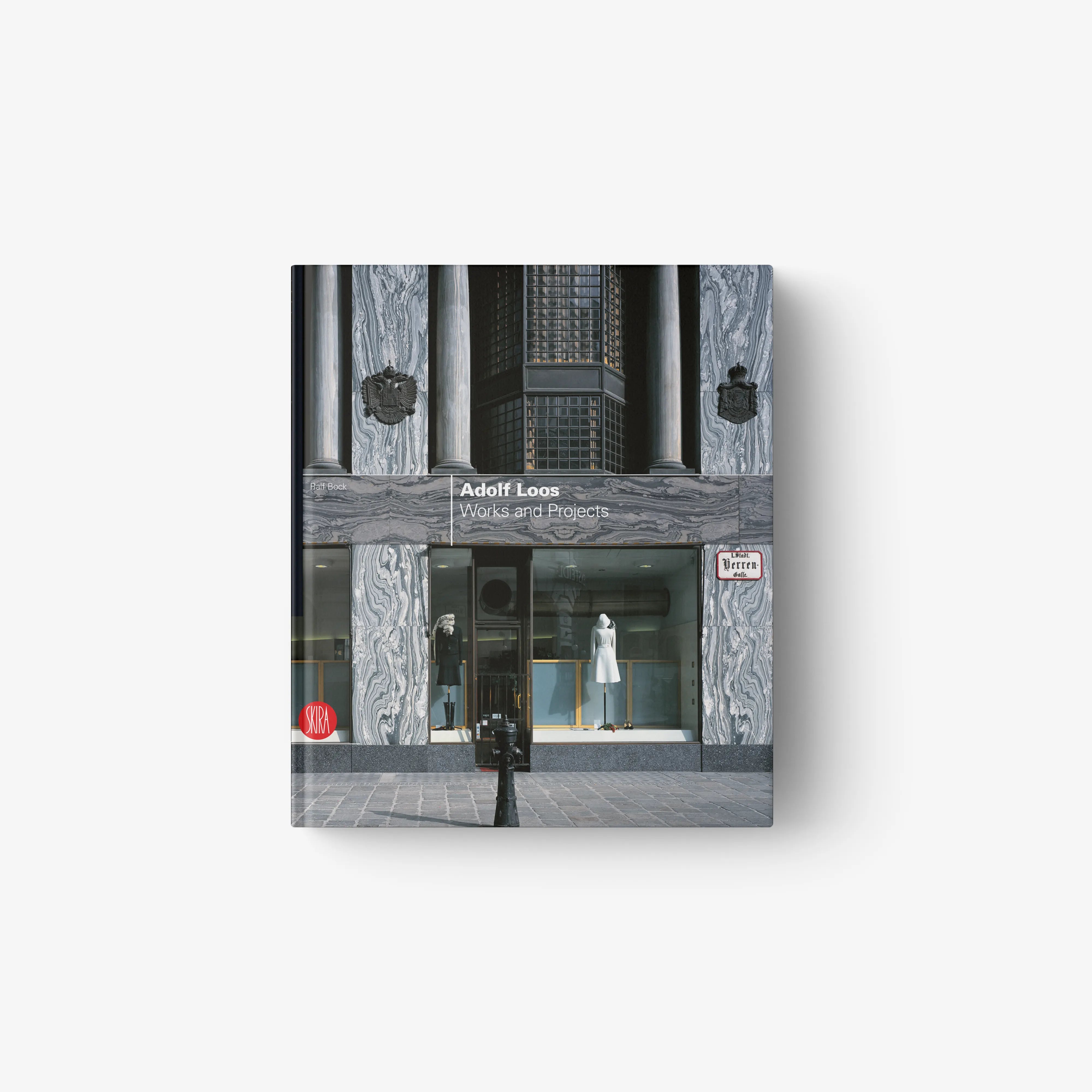 Architecture book with cover photo of a building facade, gray stone and windows