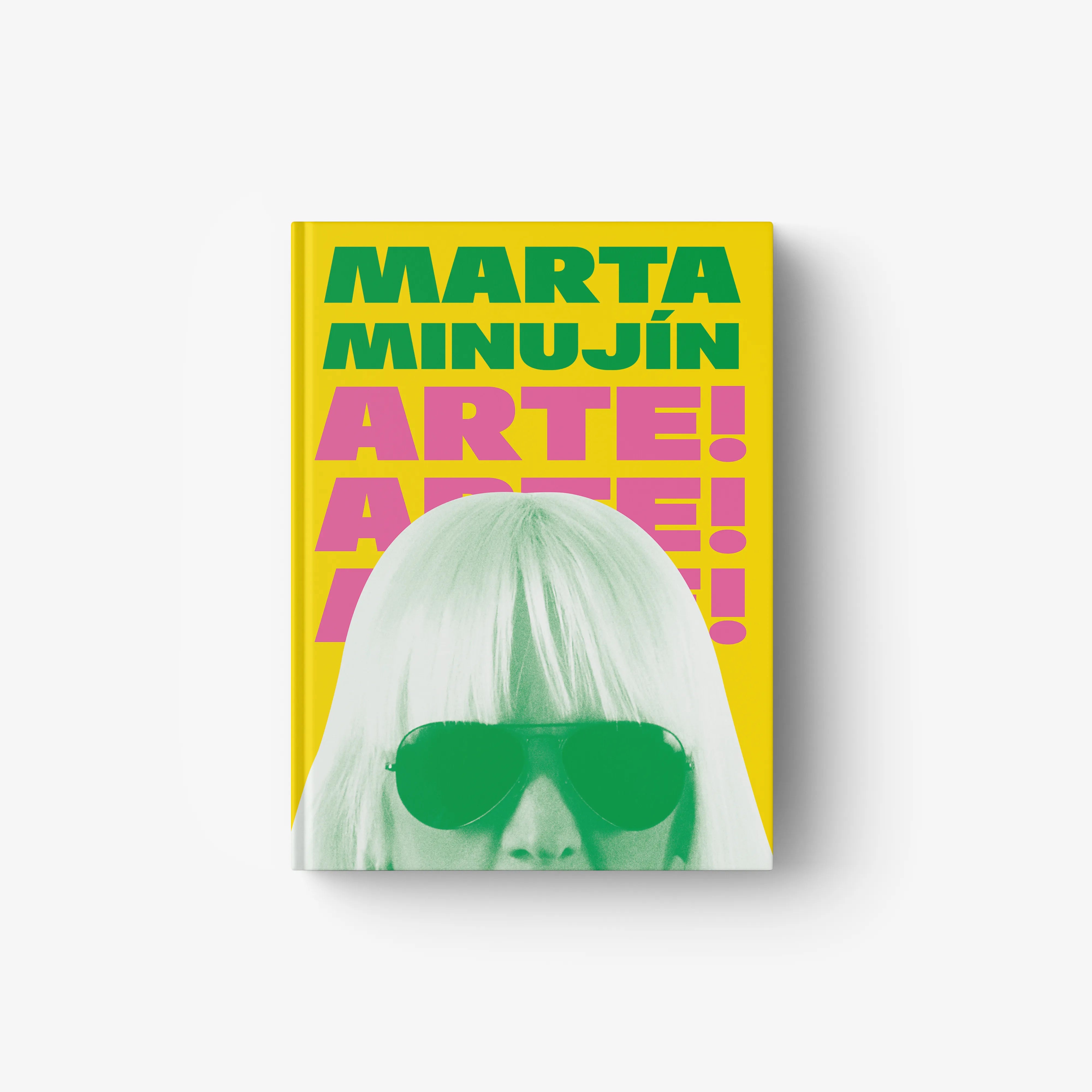 Hardcover art book volume by Skira Arte with Marta Minujin cover, yellow and pink lettering and green illustration