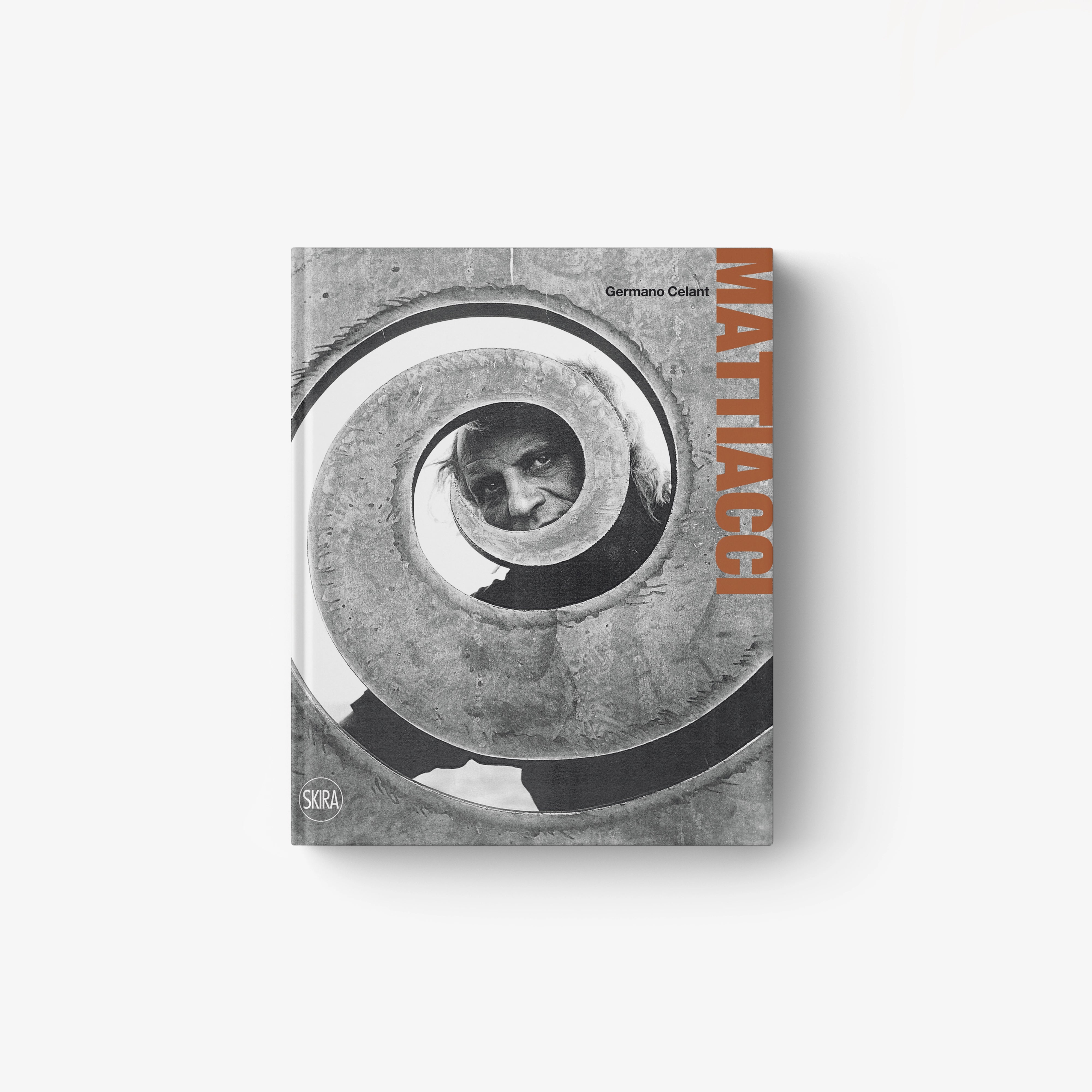 Monochrome square art book cover with circular eye motif and central portrait
