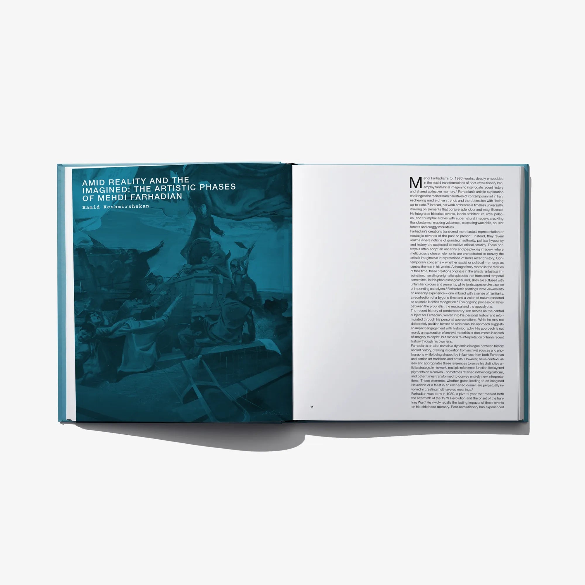 Open art book showing a left photo panel and a right page of dense text