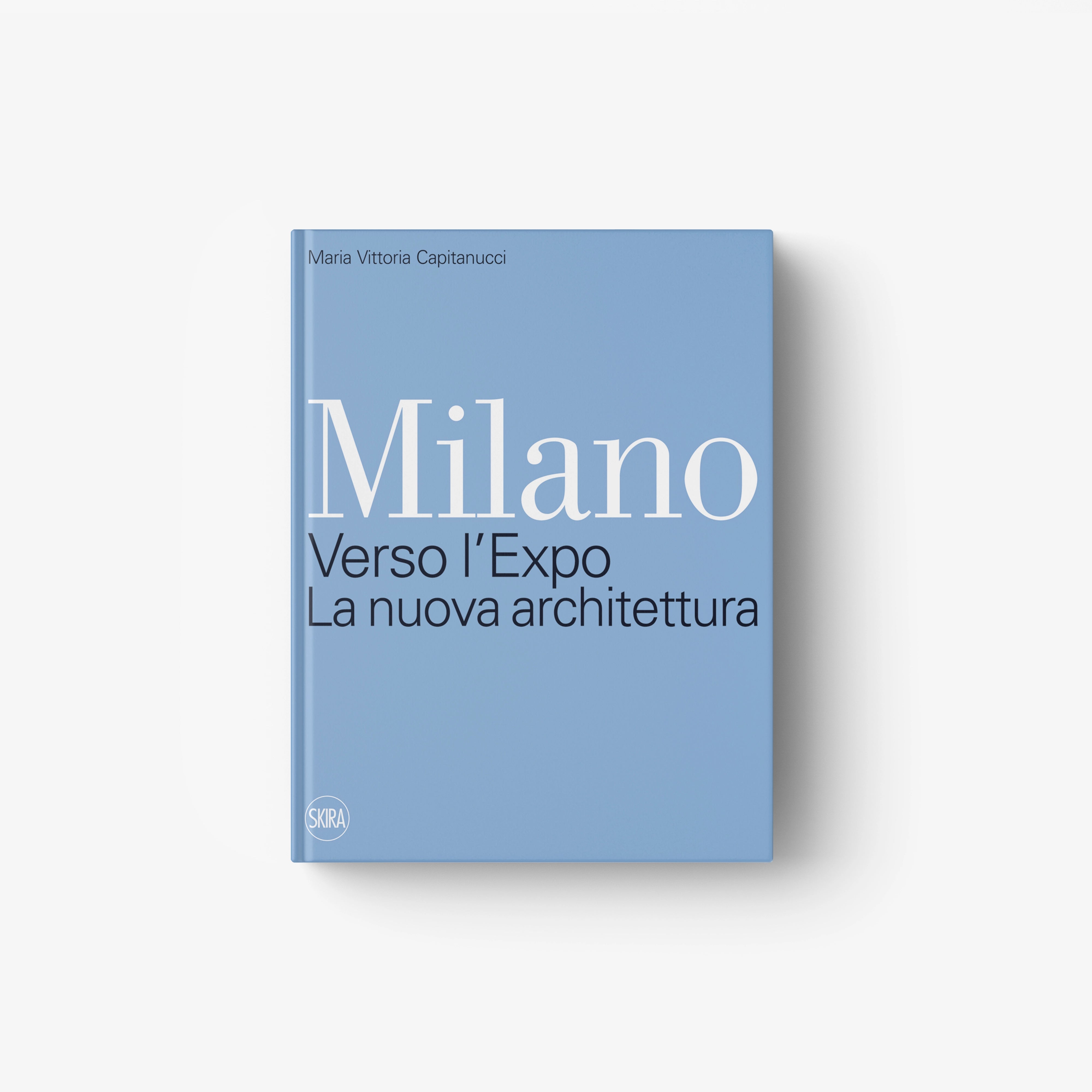 Blue hardcover book with white 'Milano' and 'Verso l'Expo' title
