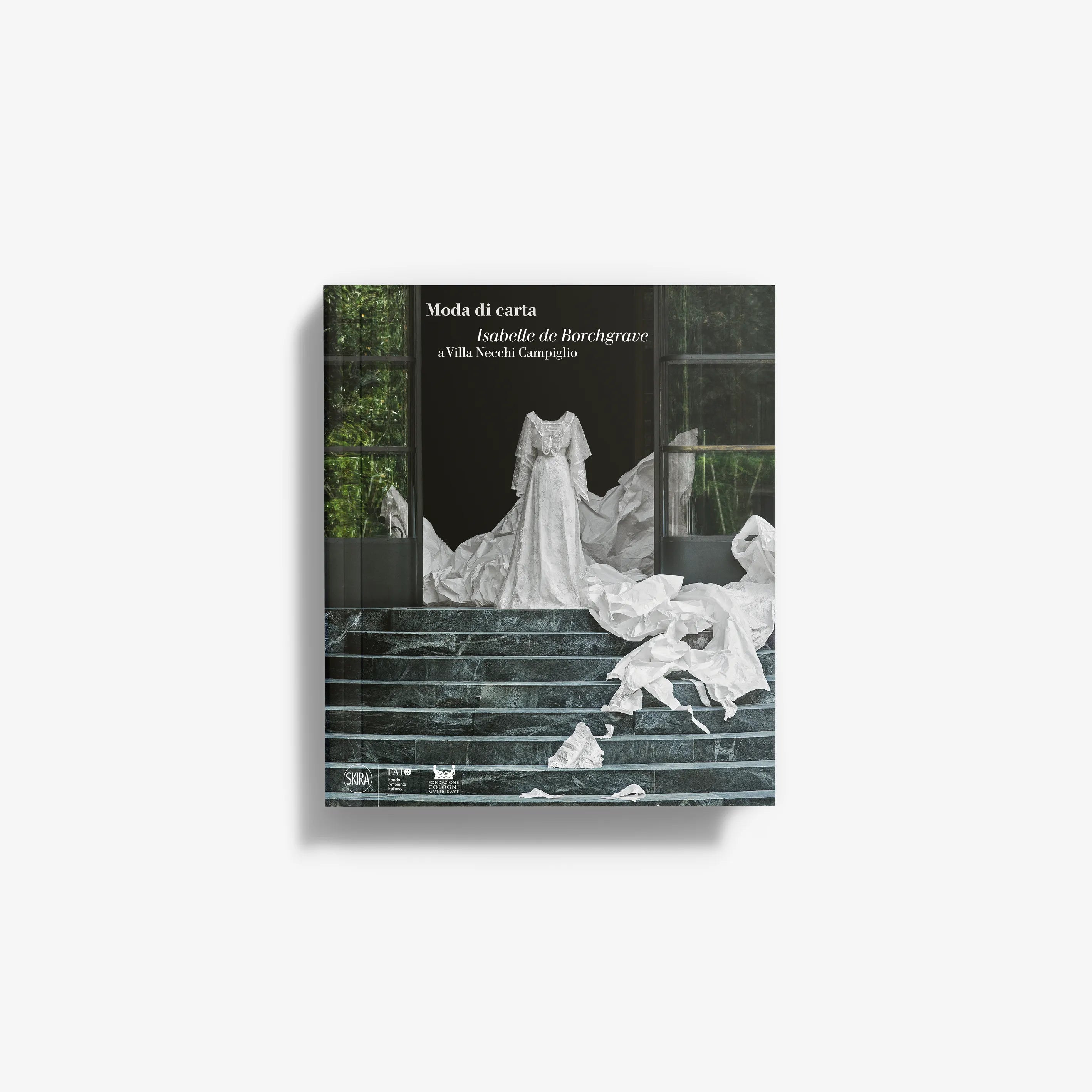 Paper fashion book cover with illustrated white dress and text