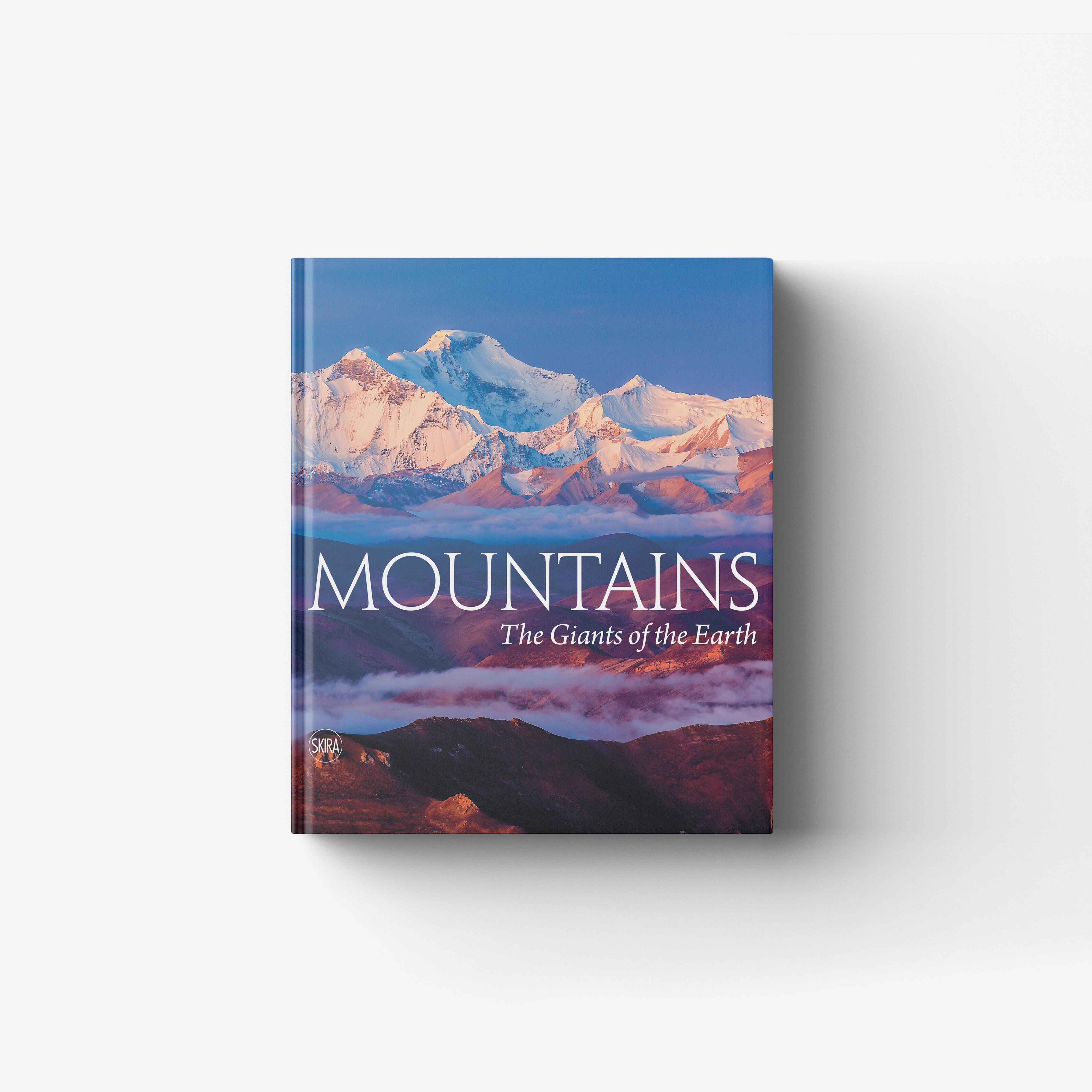 Hardcover illustrated book about mountains and mountain landscapes by Skira Arte, blue mountain cover with snowy peaks