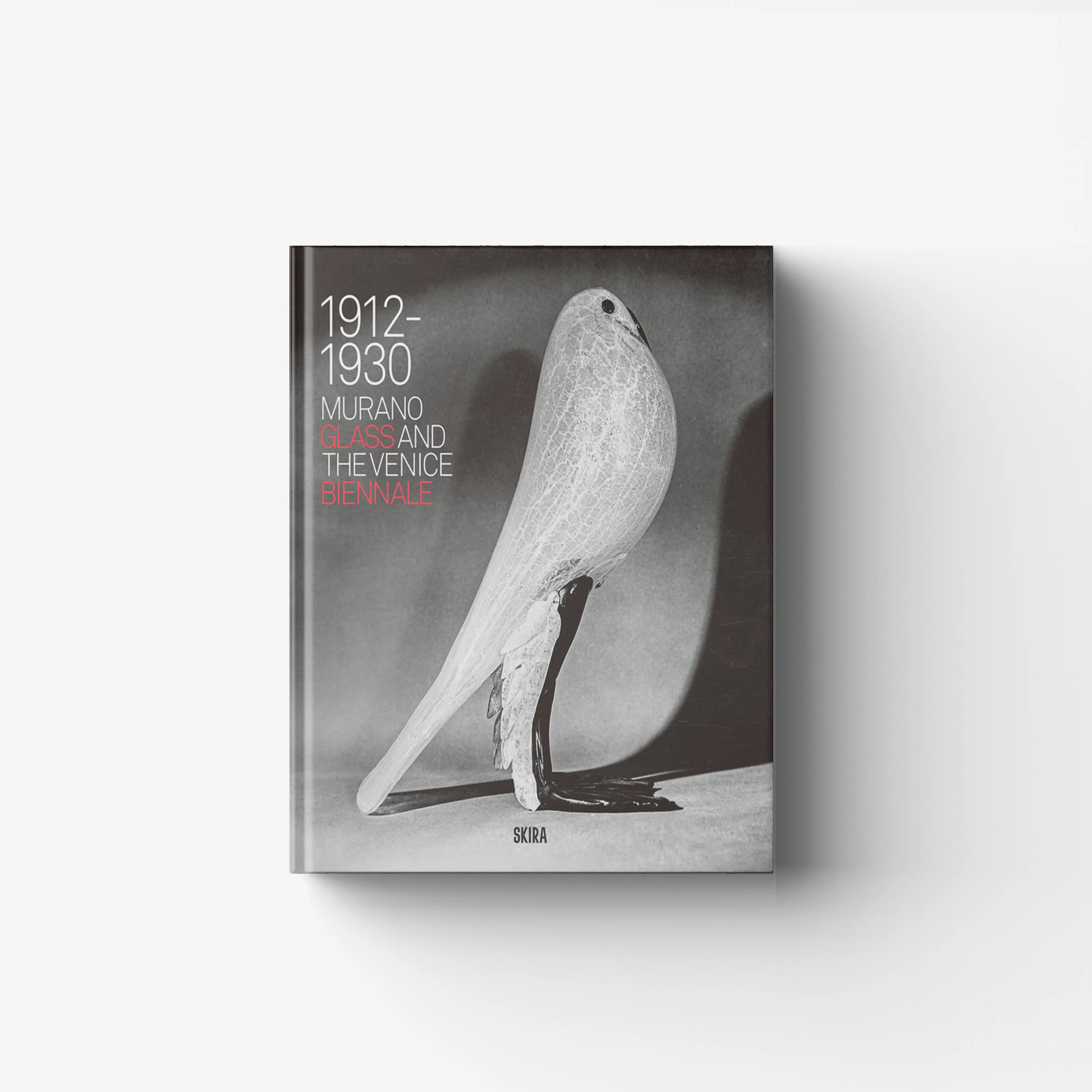 Hardback art book on Murano glass at the Venice Biennale, Skira Arte, with grey cover and white glass sculpture
