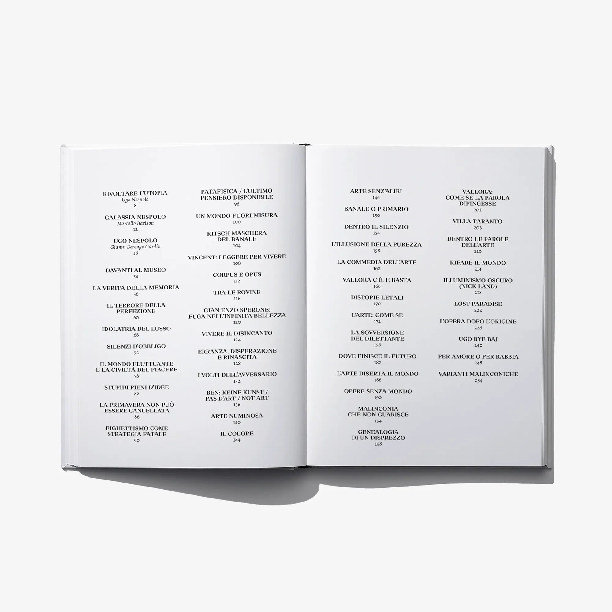 Open art book showing table of contents with dense Italian text