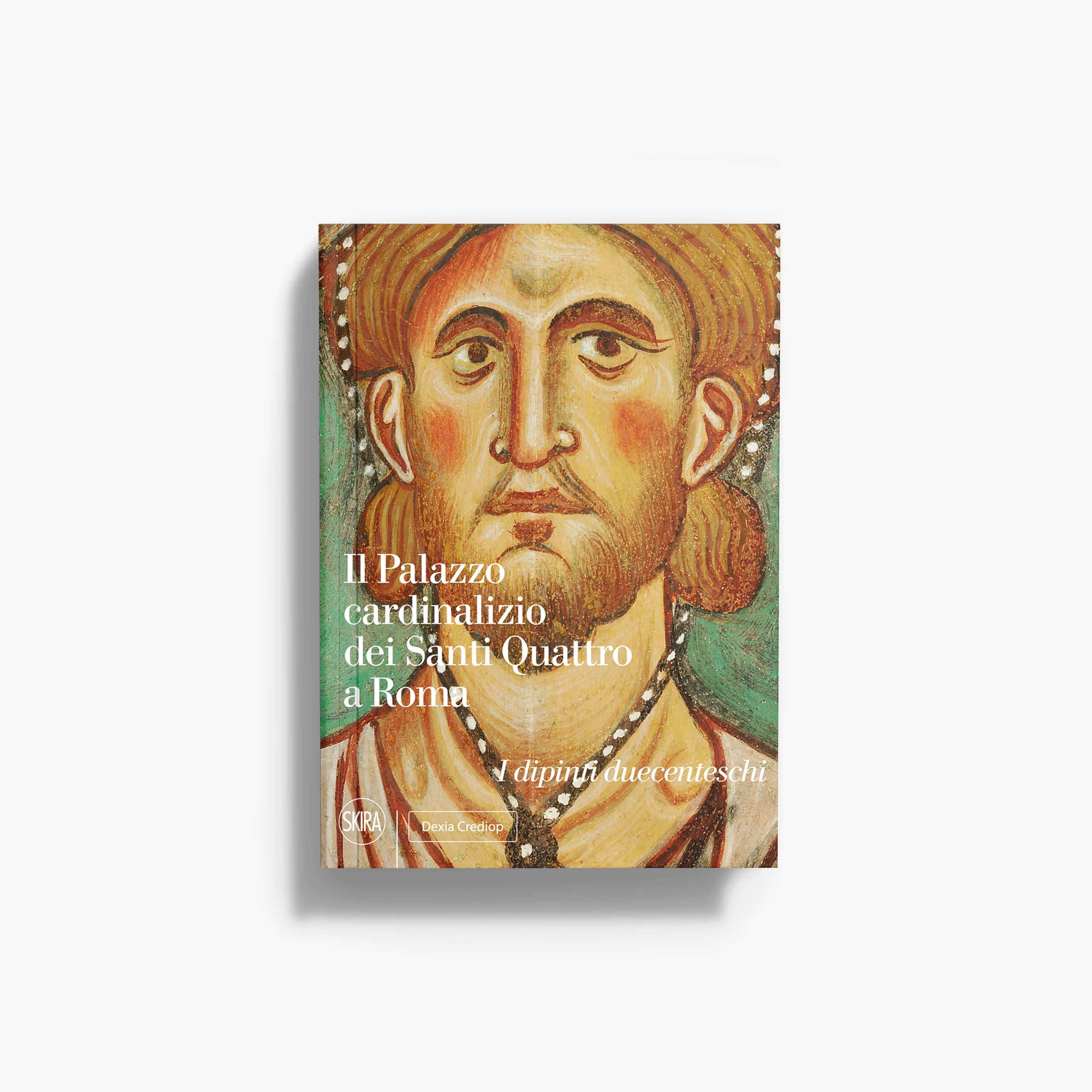 Art book cover with illustrated face and ornate golden background