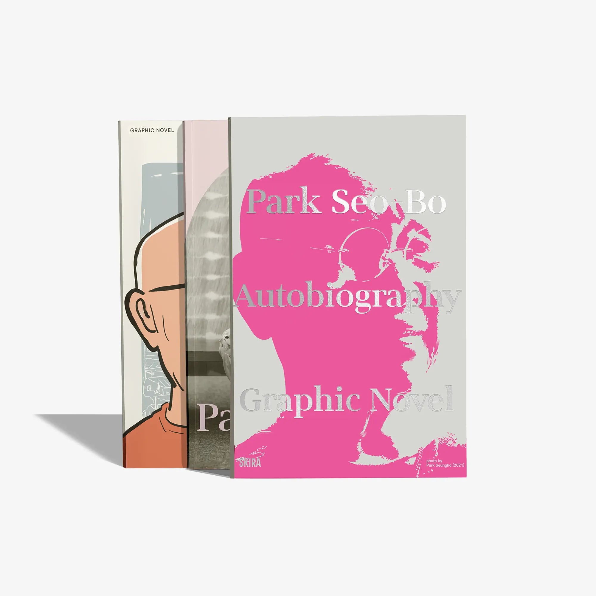 Autobiography graphic novel book cover with pink portrait and title text
