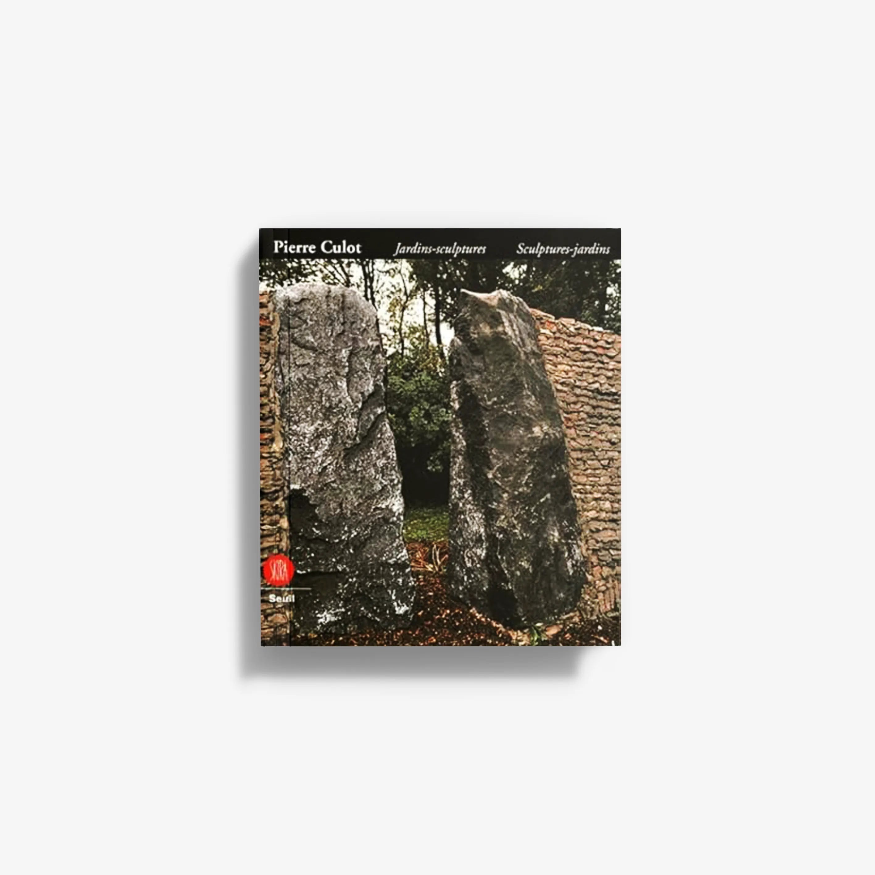 Garden sculpture book cover with dark stone statues and Pierre Culot title text
