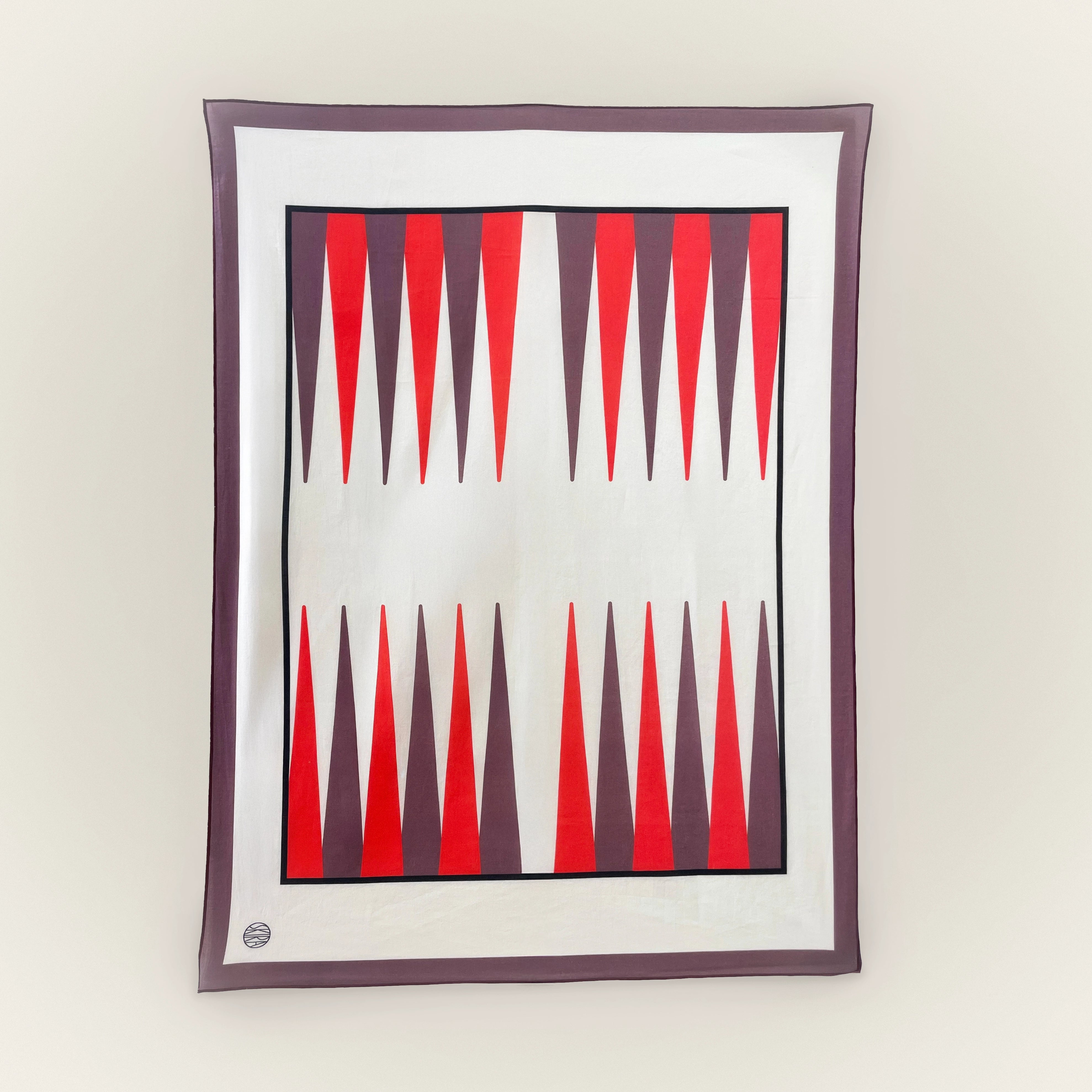 Red backgammon pattern scarf with black and white stripes, folded