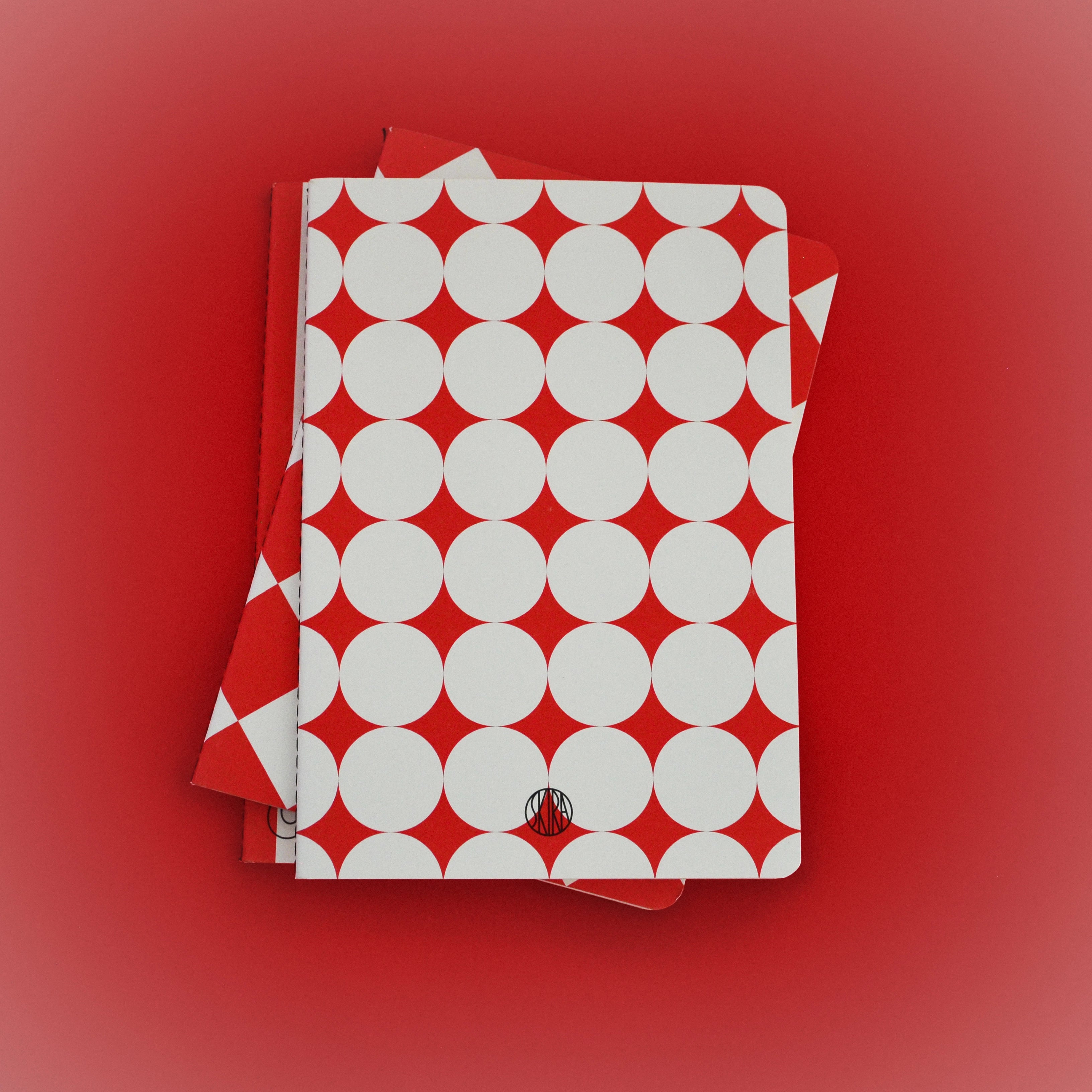 Skira notebook with red and white circular pattern cover