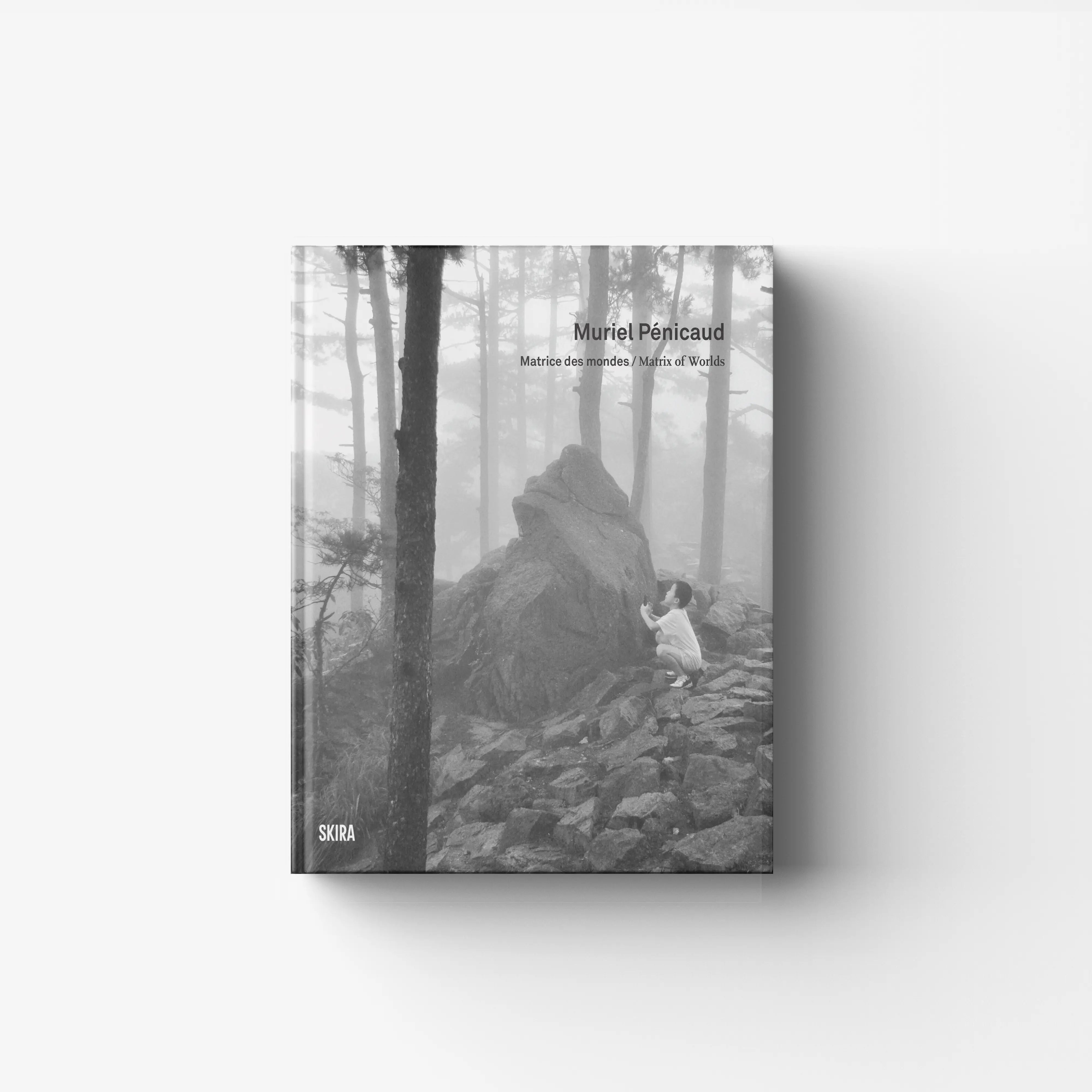 Art book in black and white by Skira Arte, Muriel Pénicaud, Matrix of Worlds, with forest trees and rocks cover