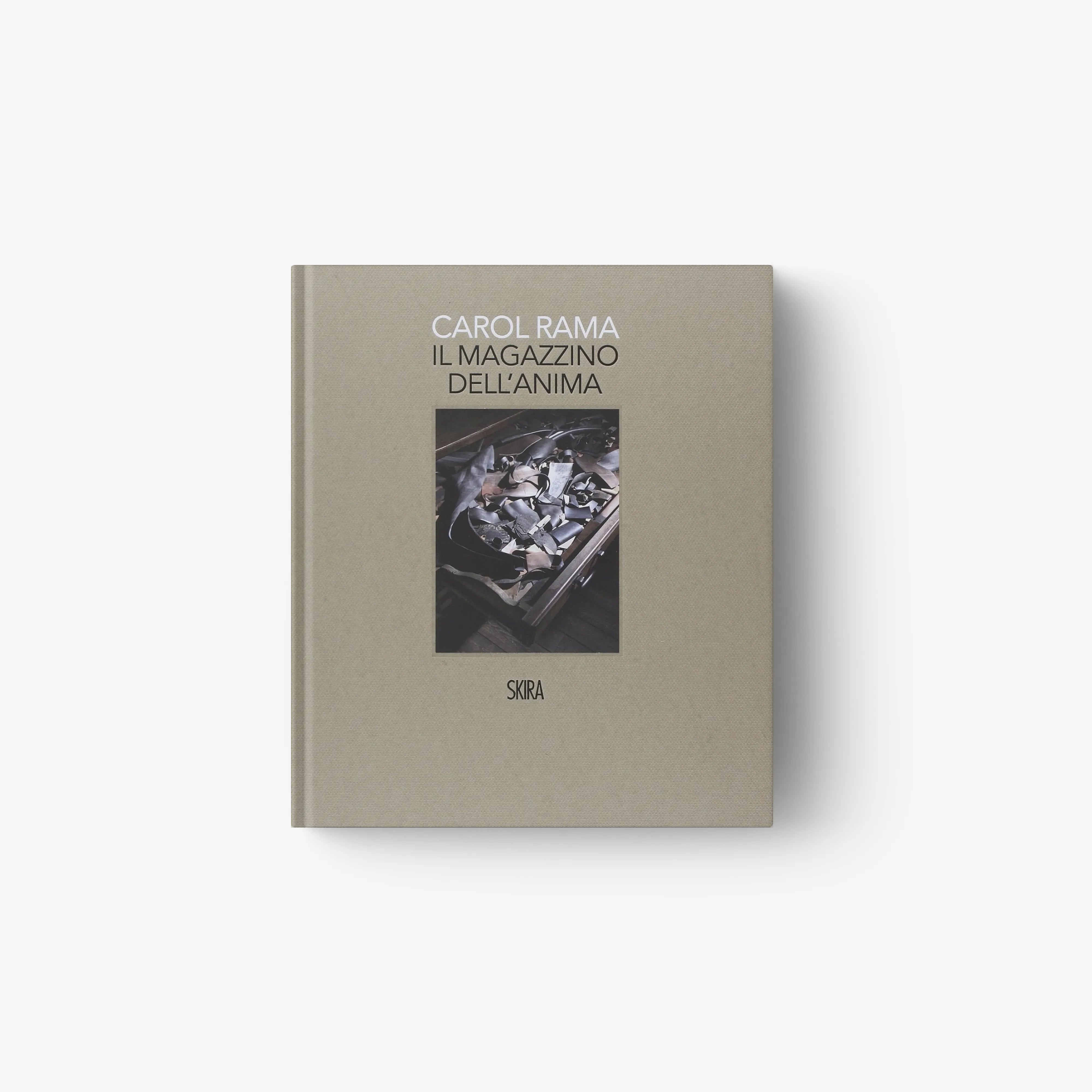 Beige hardcover art book with illustrated cover featuring abstract figures in a dark scene.