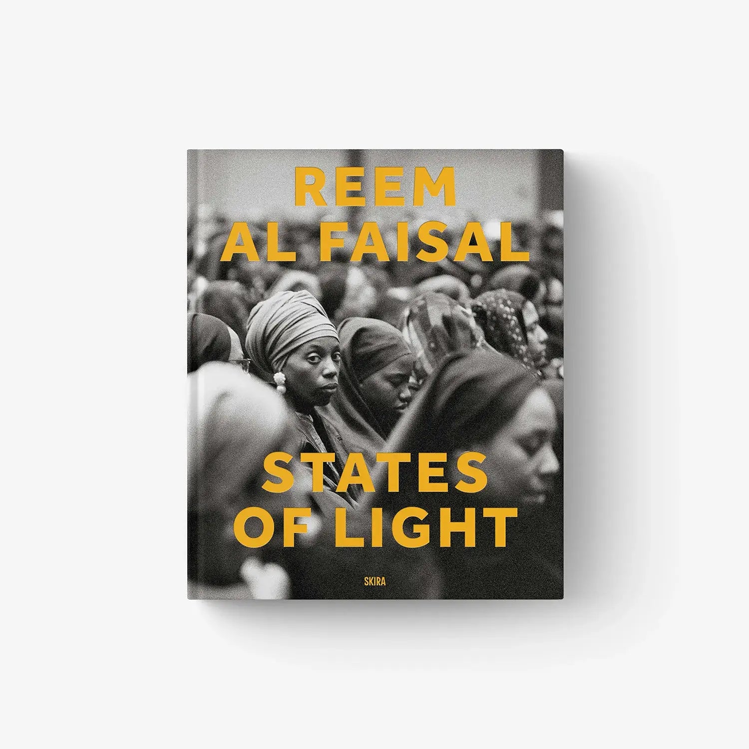 Reem Al-Faisal photo book, black-and-white cover with orange “States of Light” text