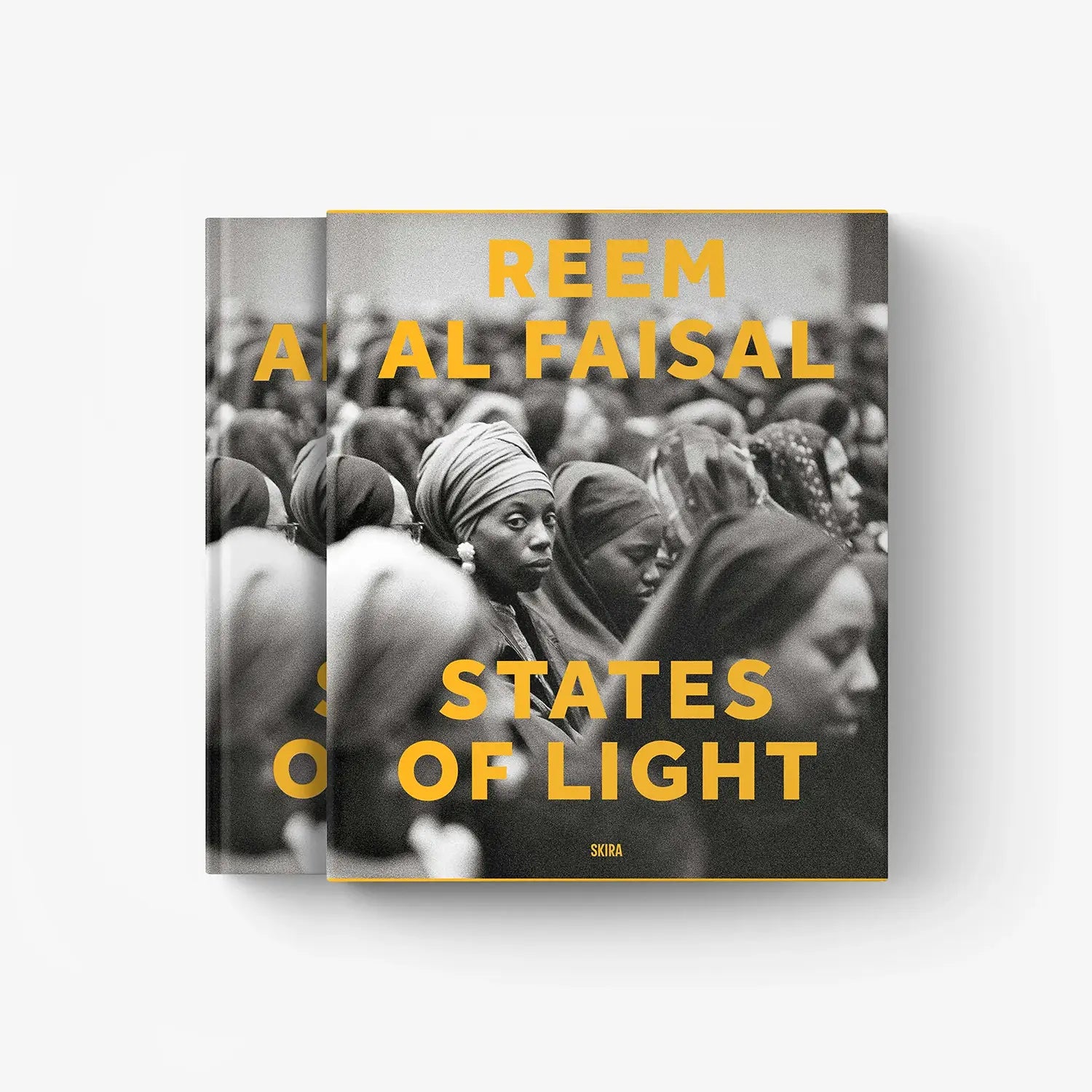 States of Light photo book, front cover with crowd portraits and orange lettering