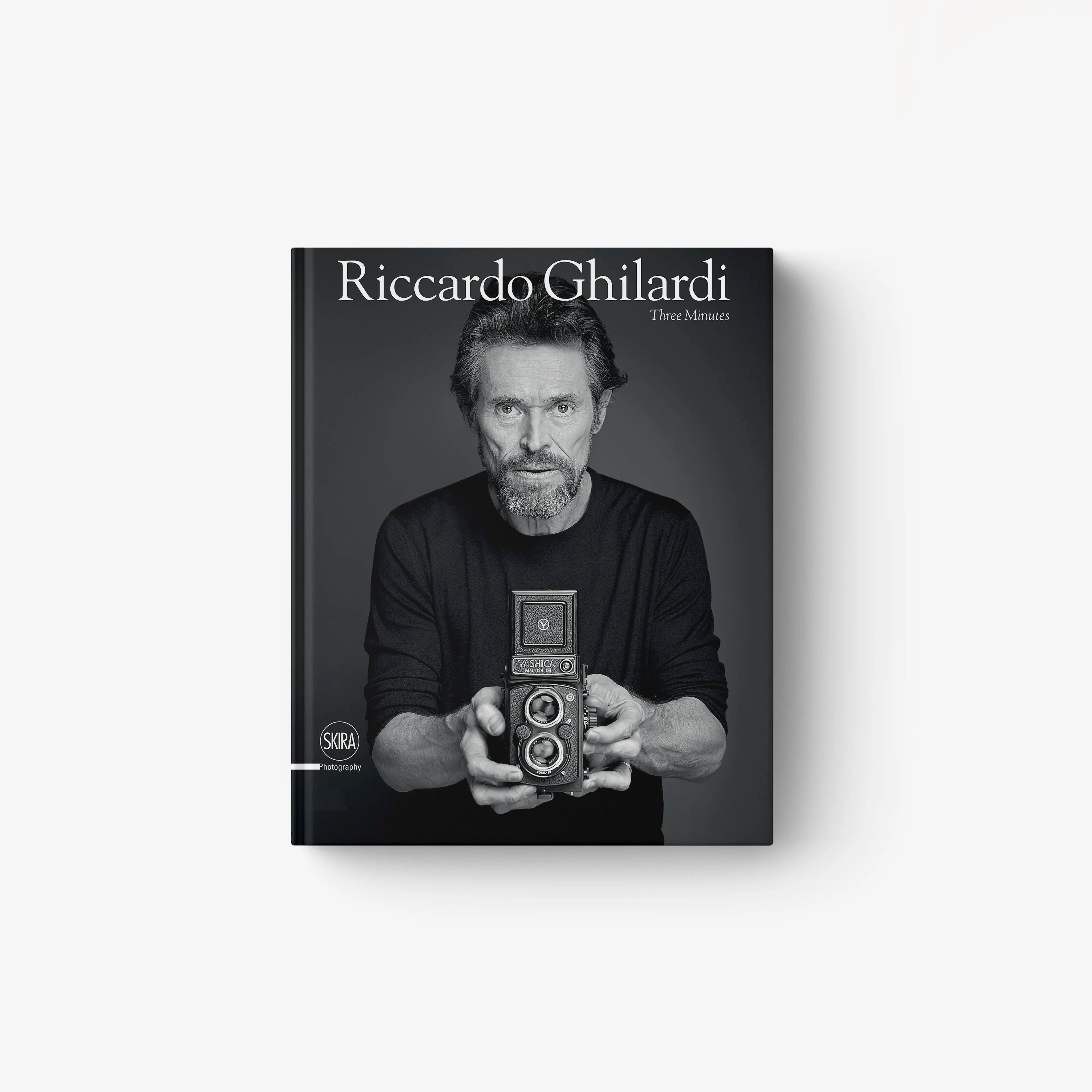 Hardback portrait photography book in black with Riccardo Ghilardi and Skira Arte, featuring celebrity portraits at film festivals