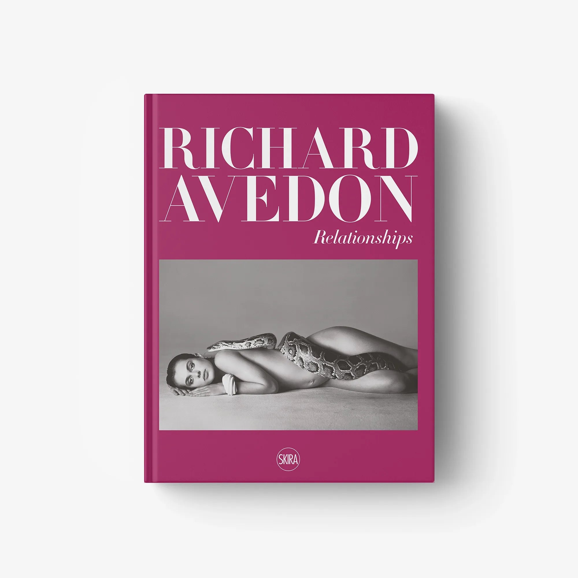Richard Avedon photo book, purple hardcover with title and monochrome model portrait