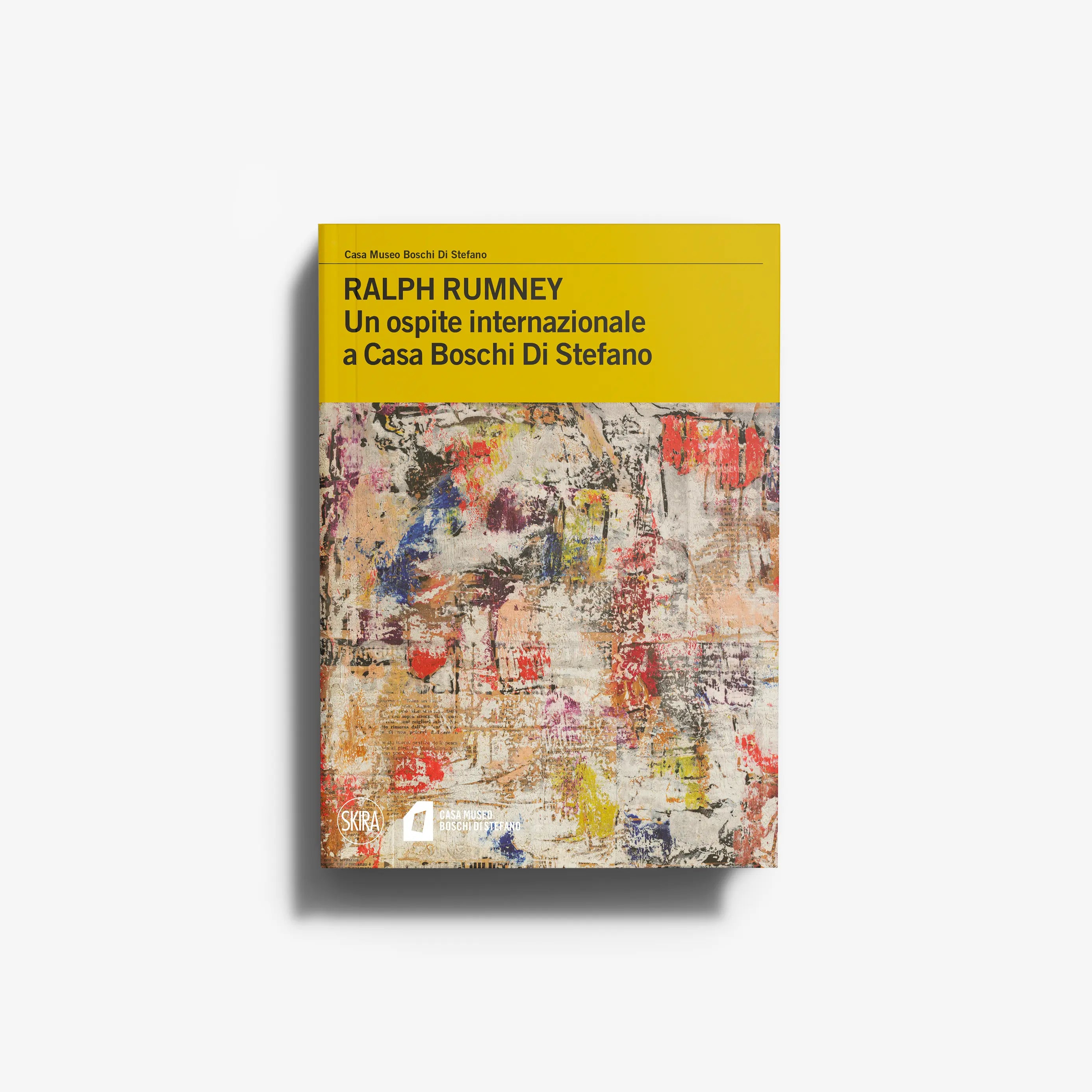 Art book by Skira Arte on Ralph Rumney with yellow cover and mixed media collage background