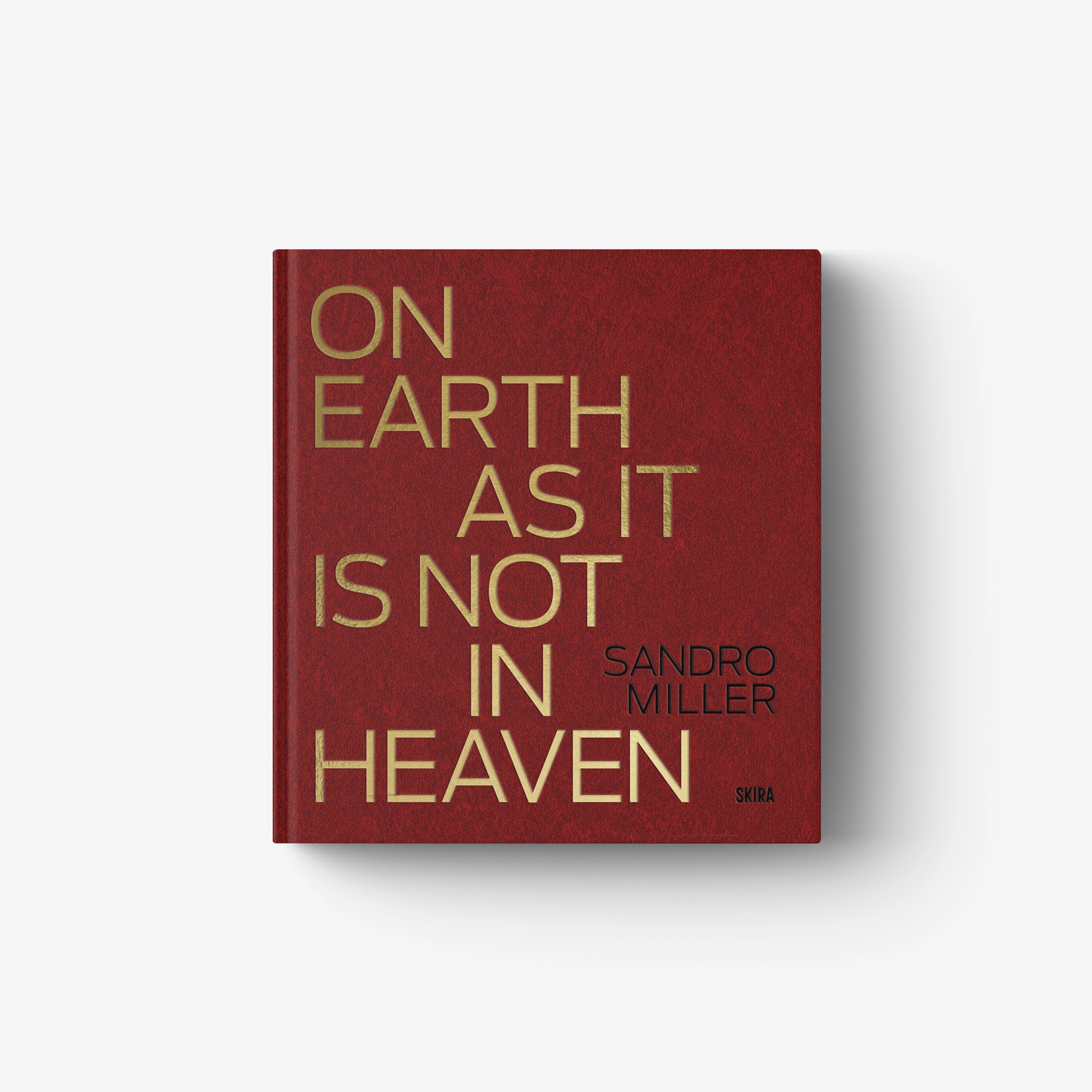 Limited edition book with dark red cover and gold typographic title text