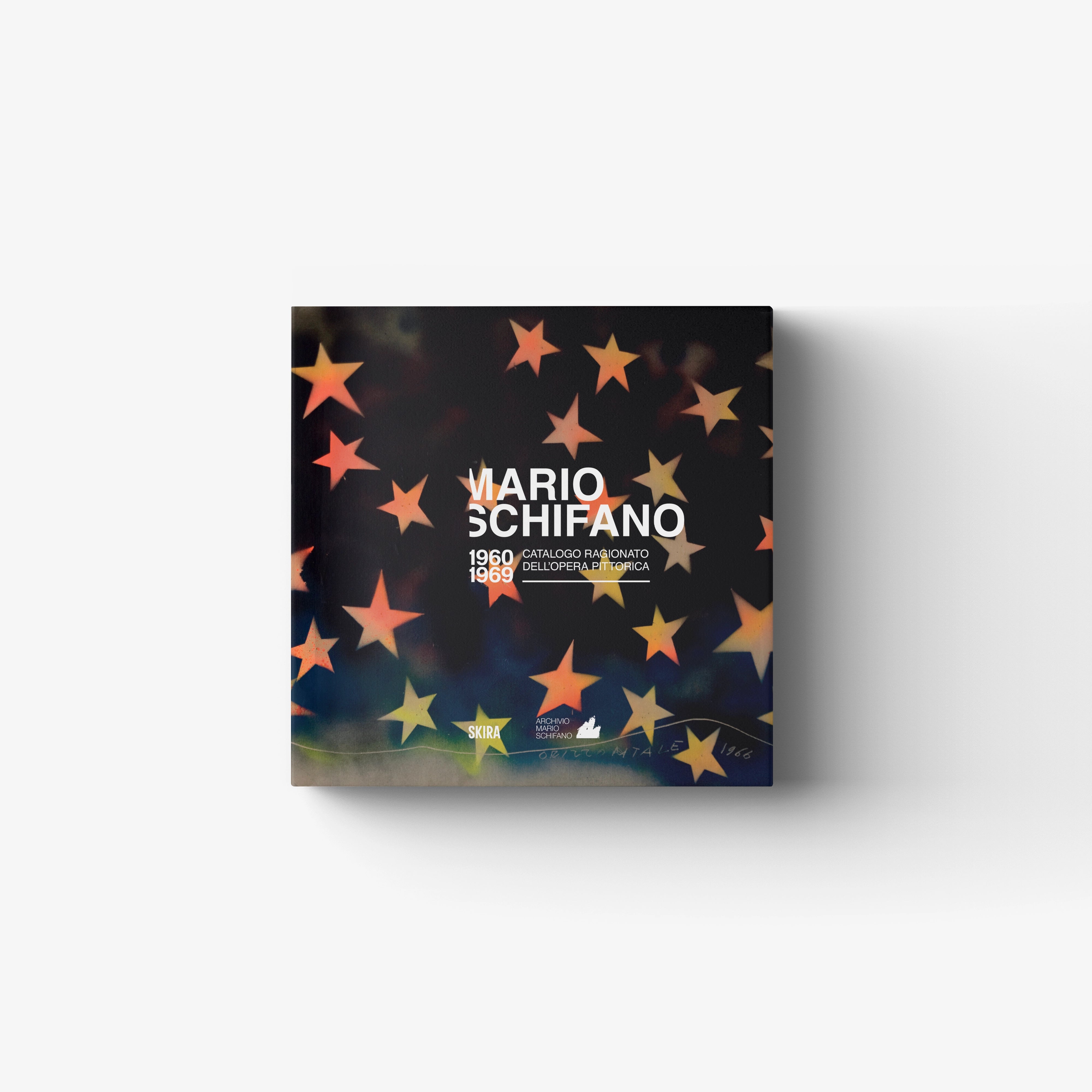 Art catalog book with dark cover and multicolor star pattern, Mario Schifano title text