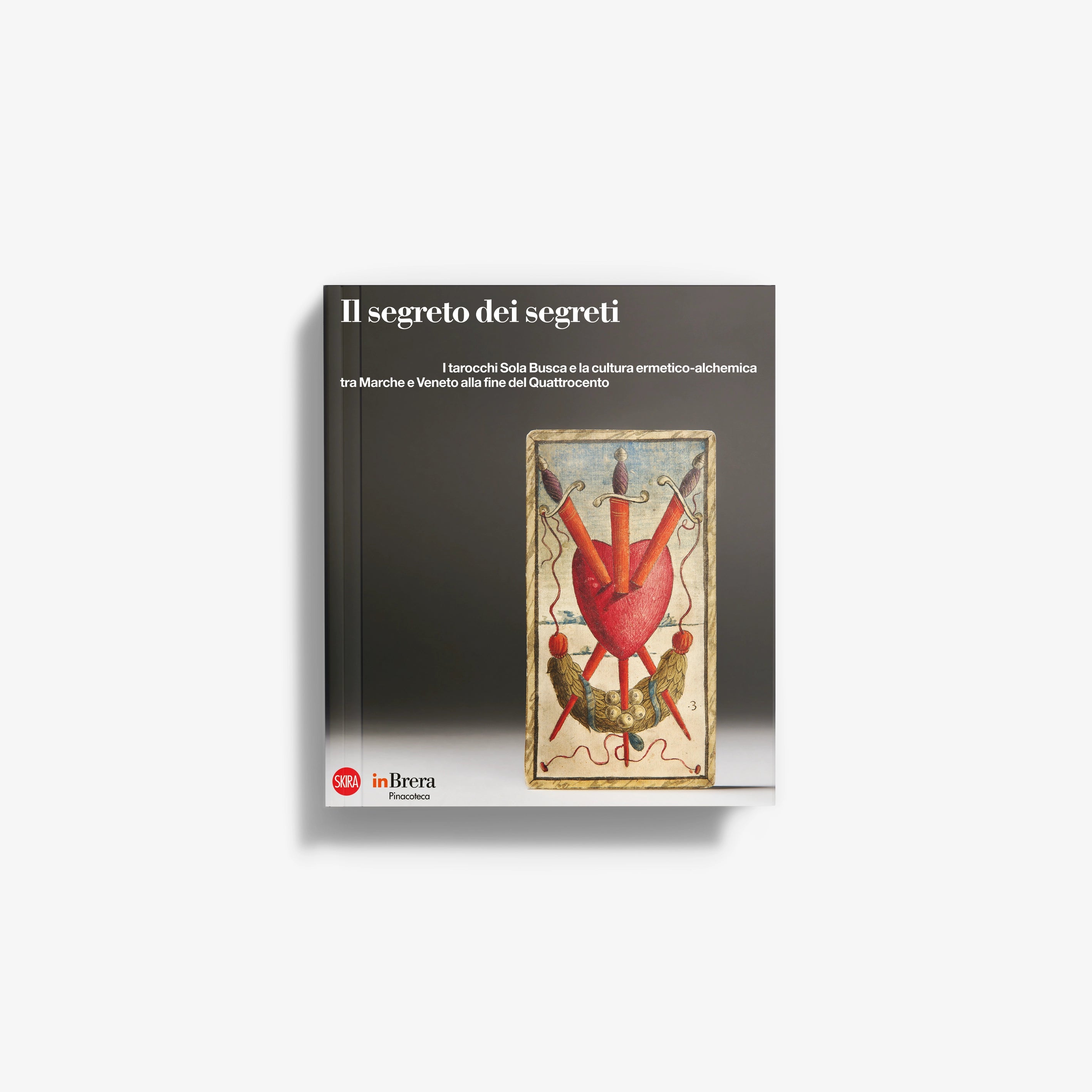 The Secret of Secrets book, dark cover with red heart-and-crown artwork