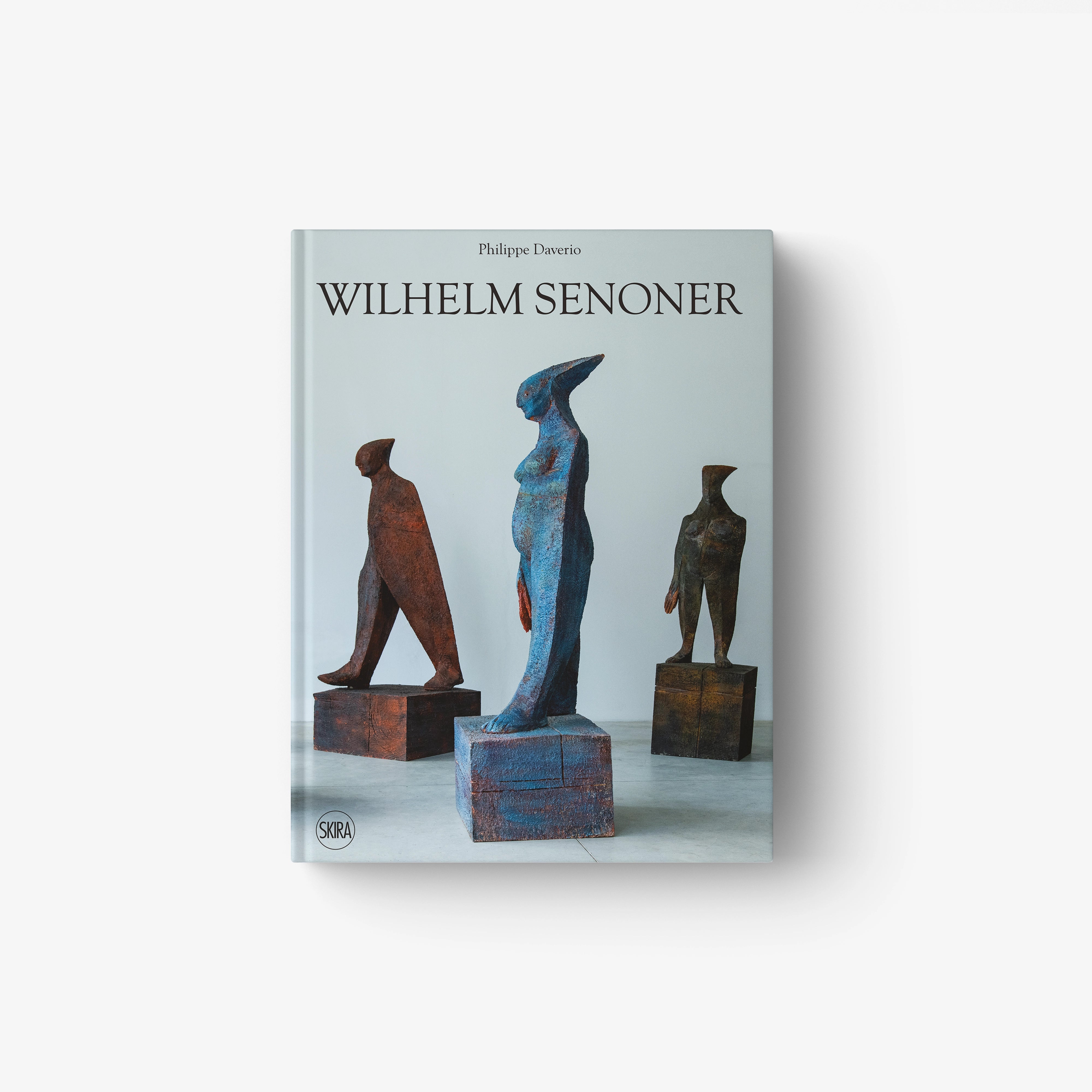 Book cover featuring three abstract bronze sculptures of human figures on square bases against a light background.
