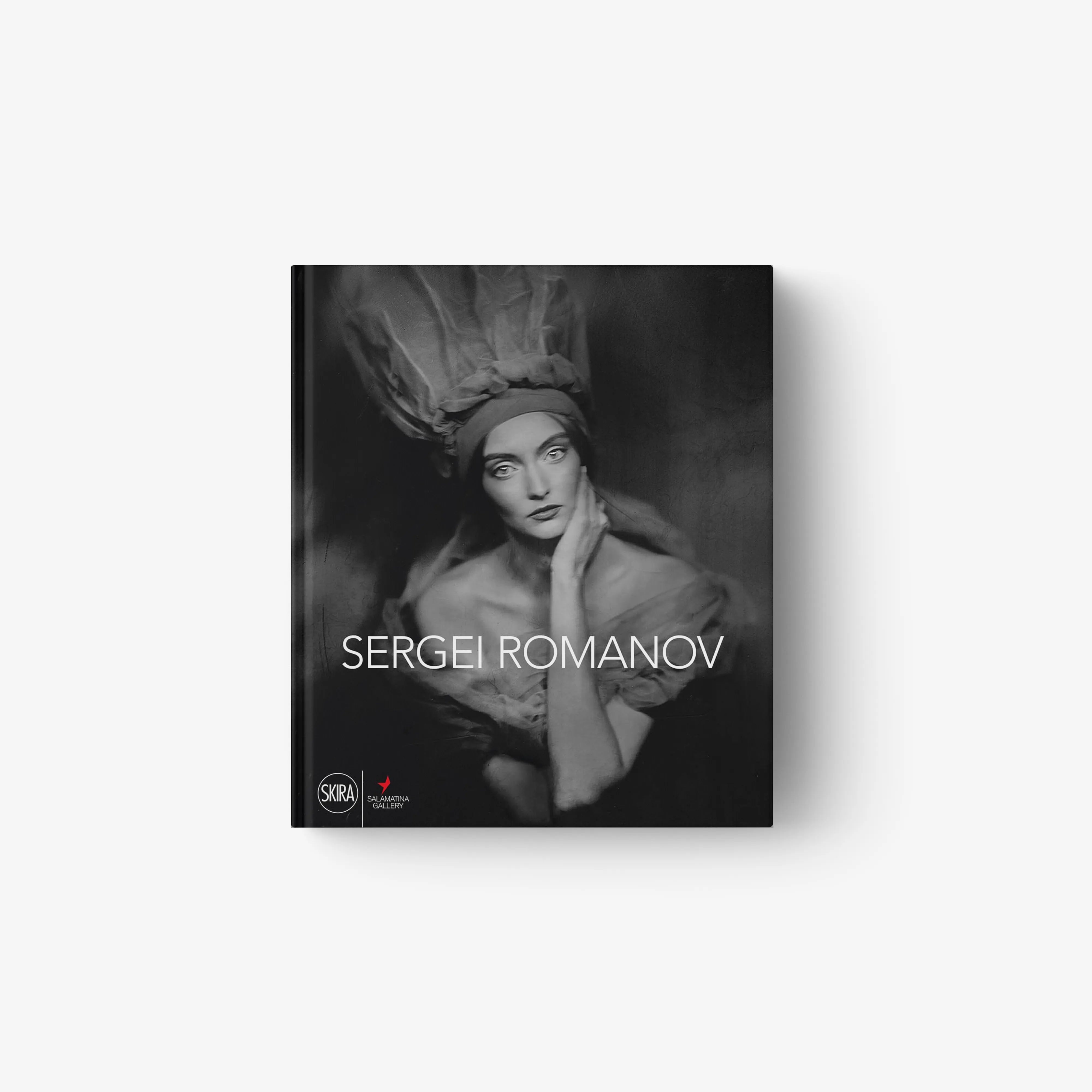 Dark hardcover book with black-and-white woman portrait and centered title text
