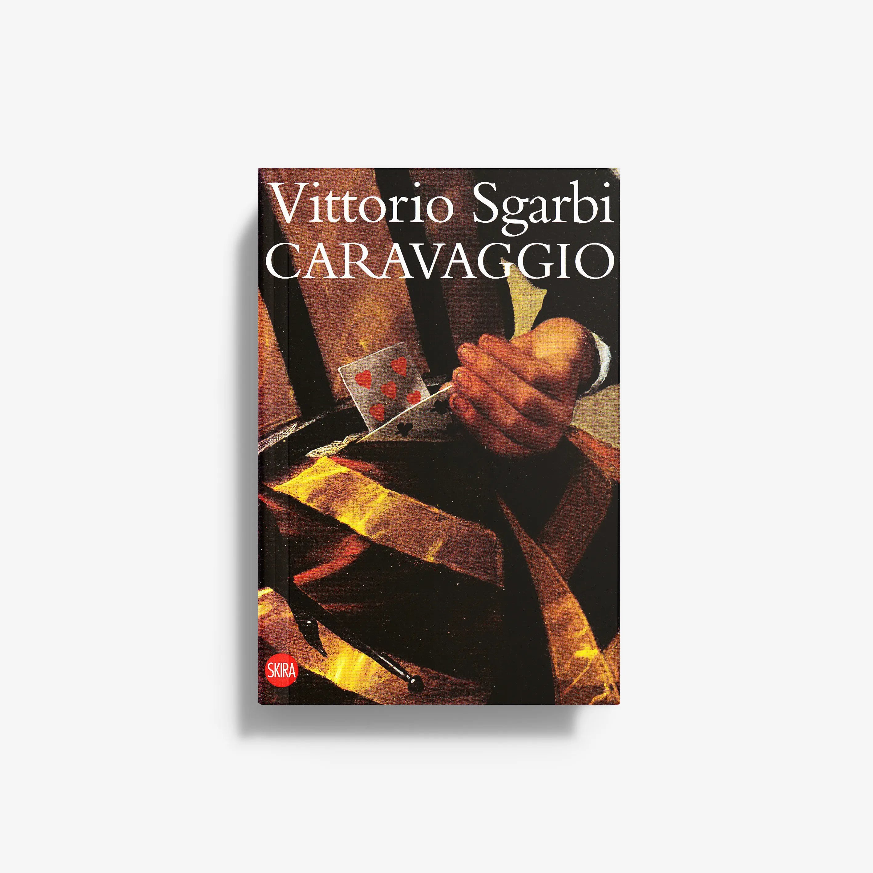 Art book cover featuring painter hand, playing cards, and dark moody illustration