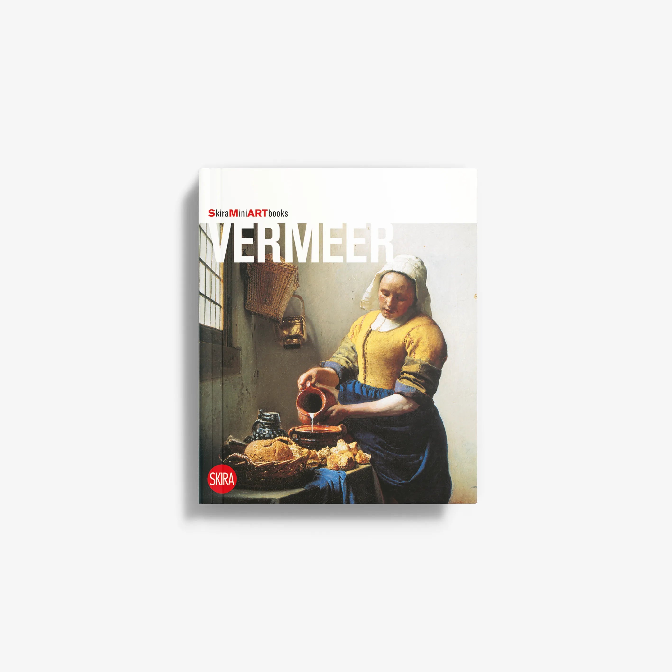 Vermeer art book with classic painting cover of a woman holding a jug