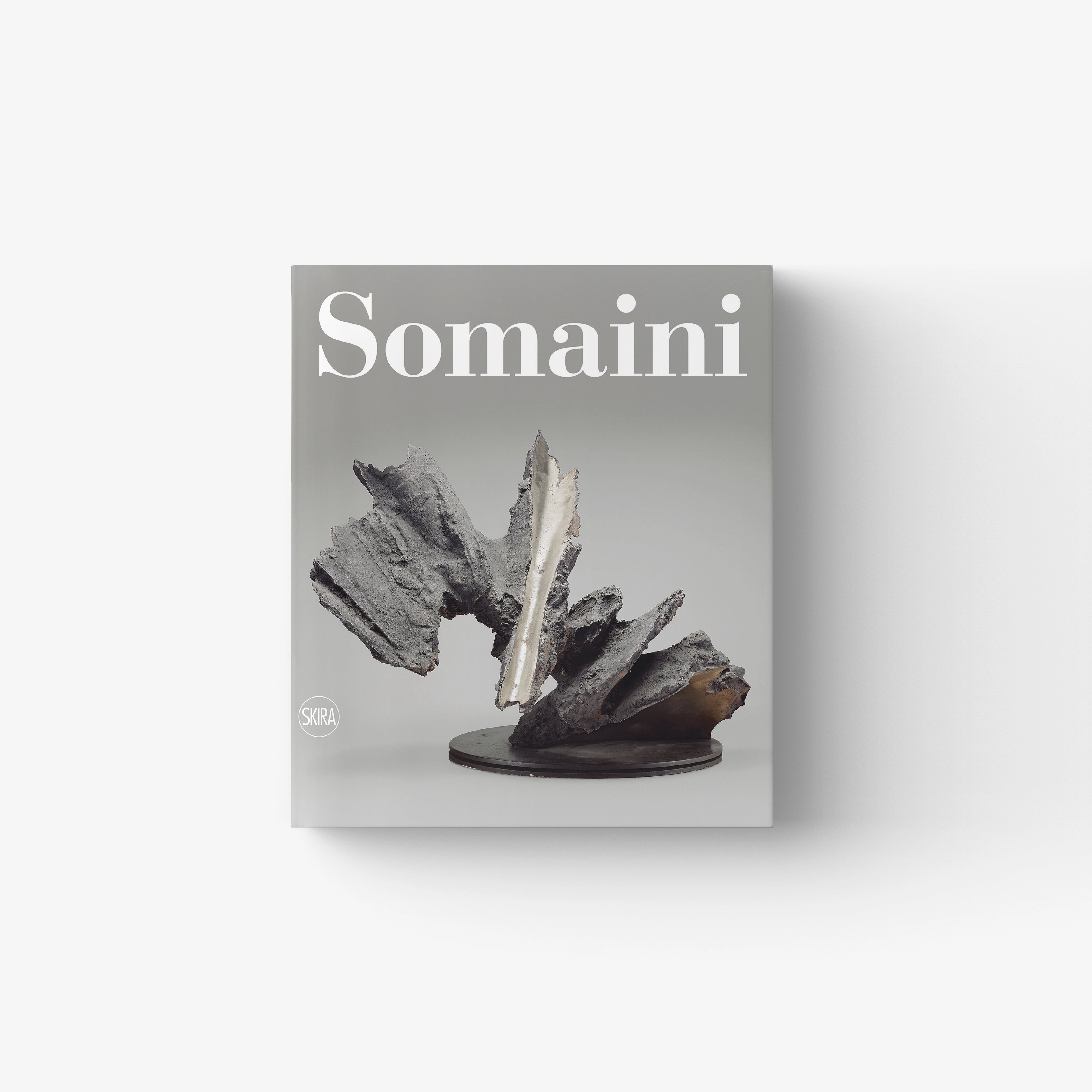 Catalogue raisonné of sculptures by Skira Arte, Somaini, grey cover with sculptural relief and white title text