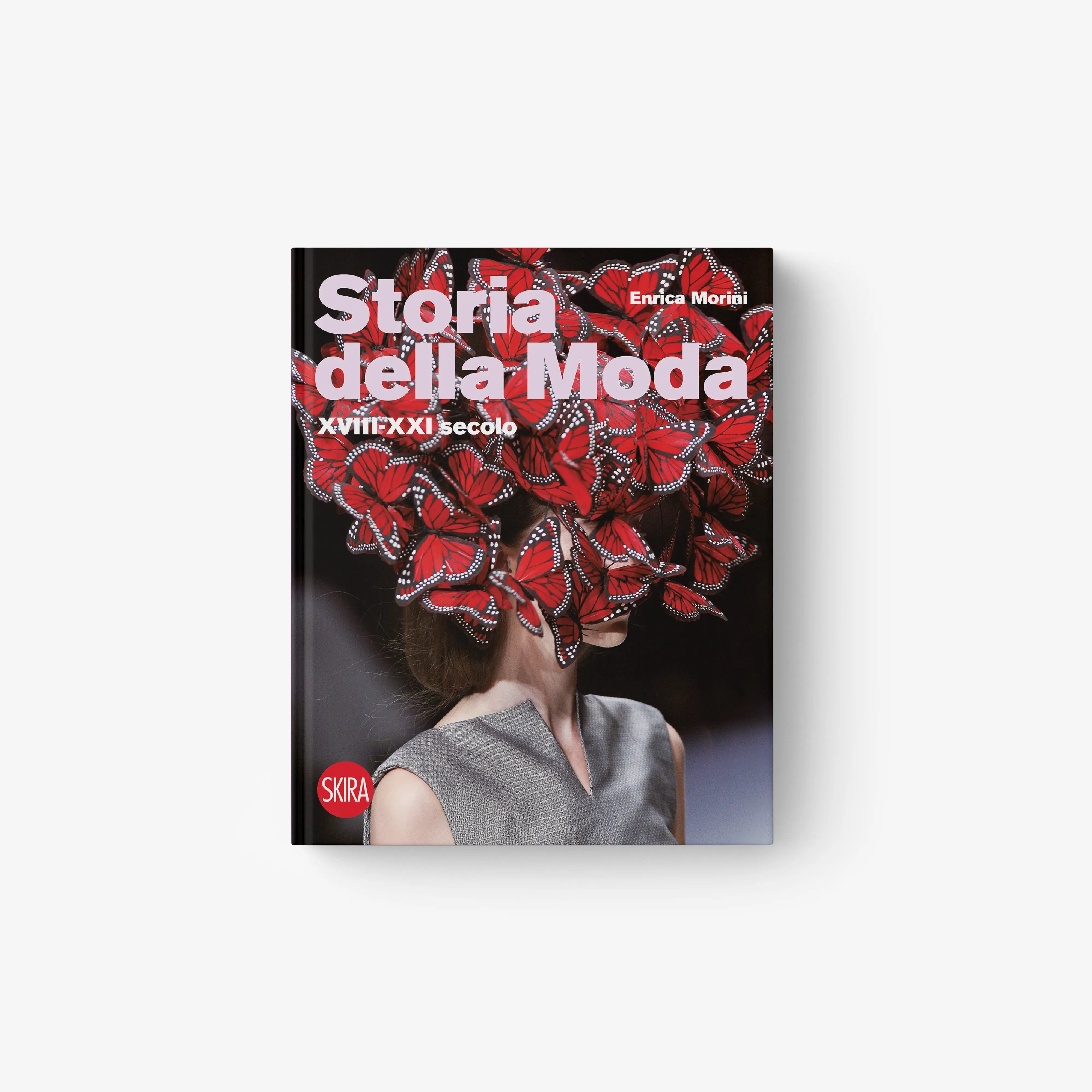 Fashion history book by Skira Arte with red and black butterfly cover, XVIII to XXI secolo section