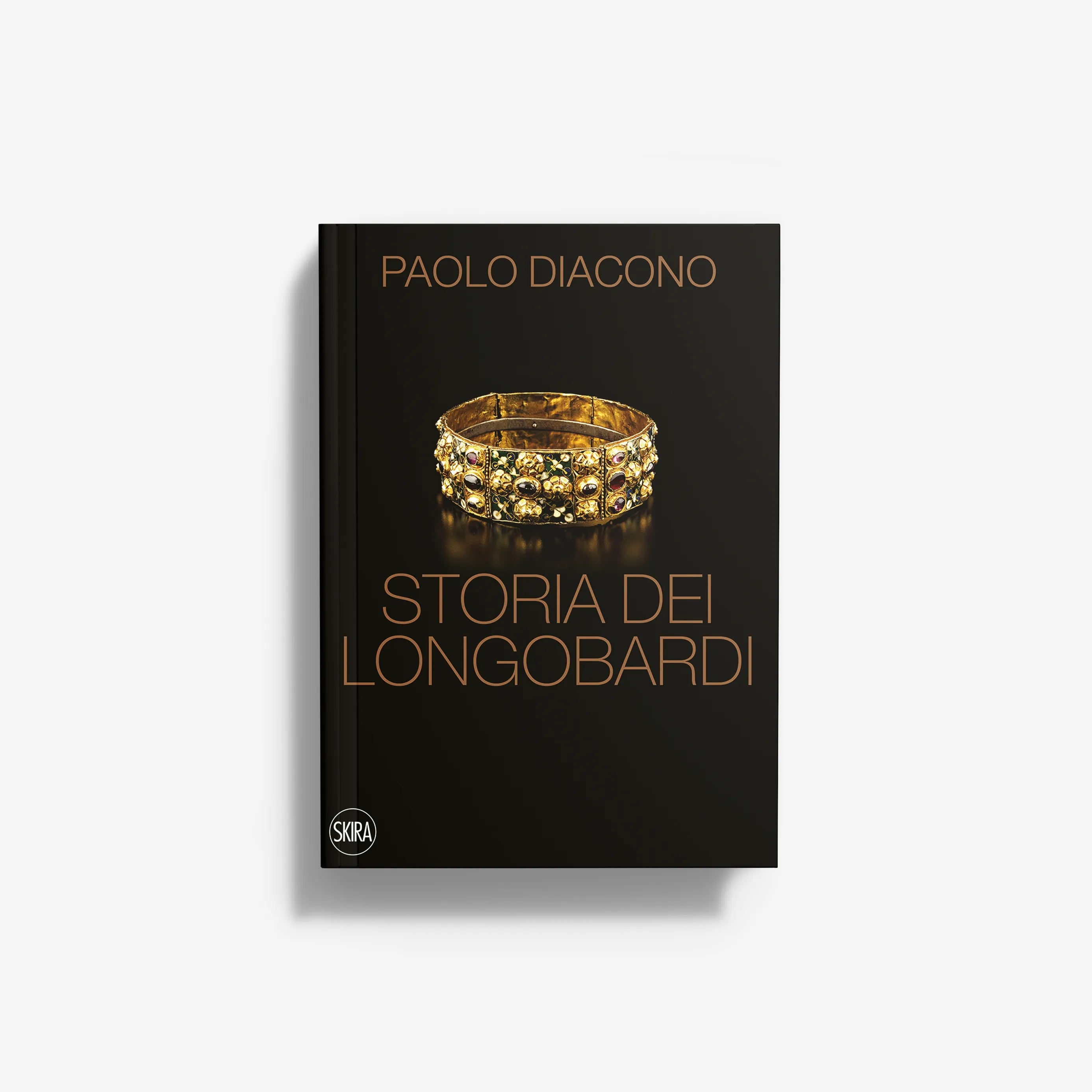Hardcover book with black cover, gold title text and photo of a gold ring