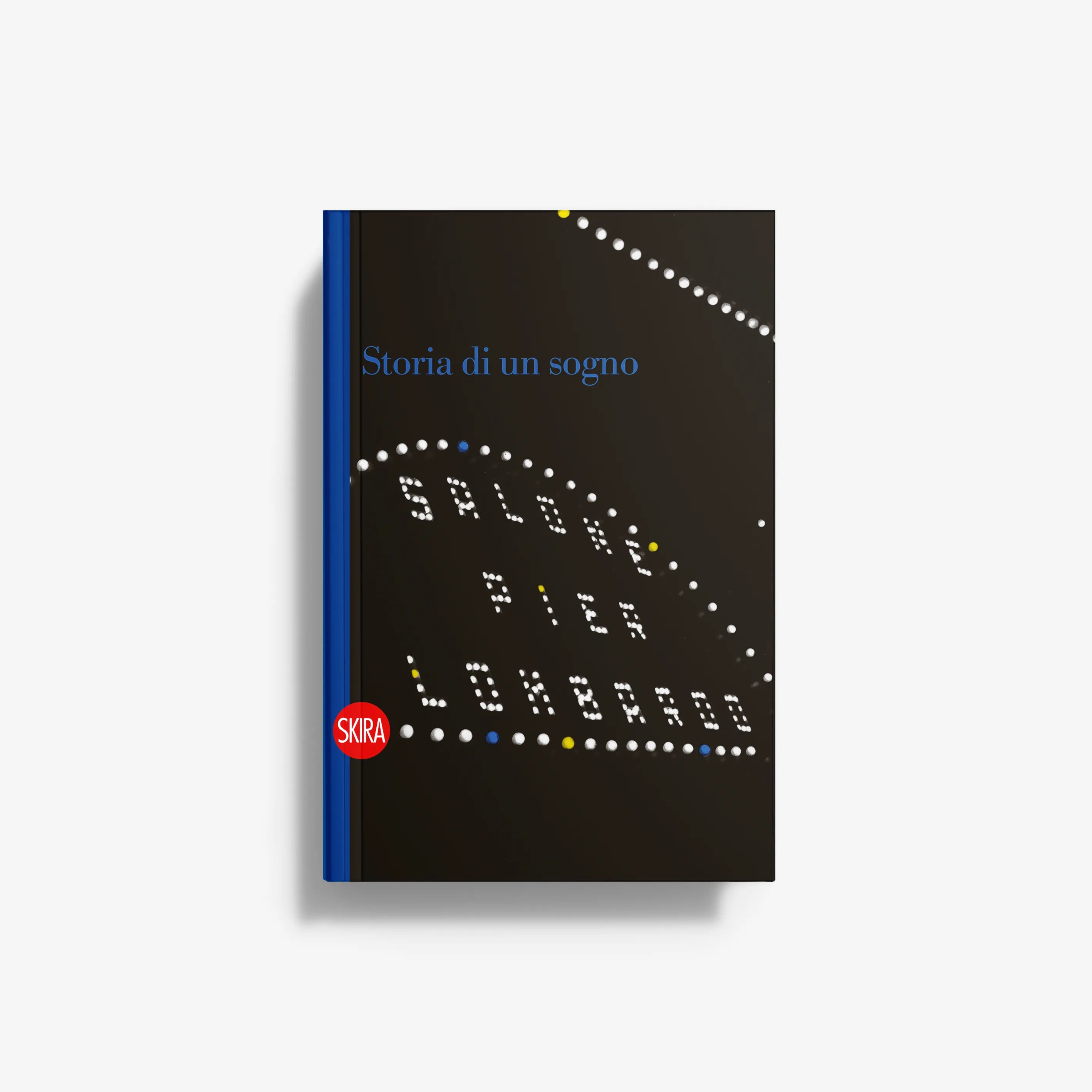 Hardcover book, black cover with blue spine and dotted light-letter design