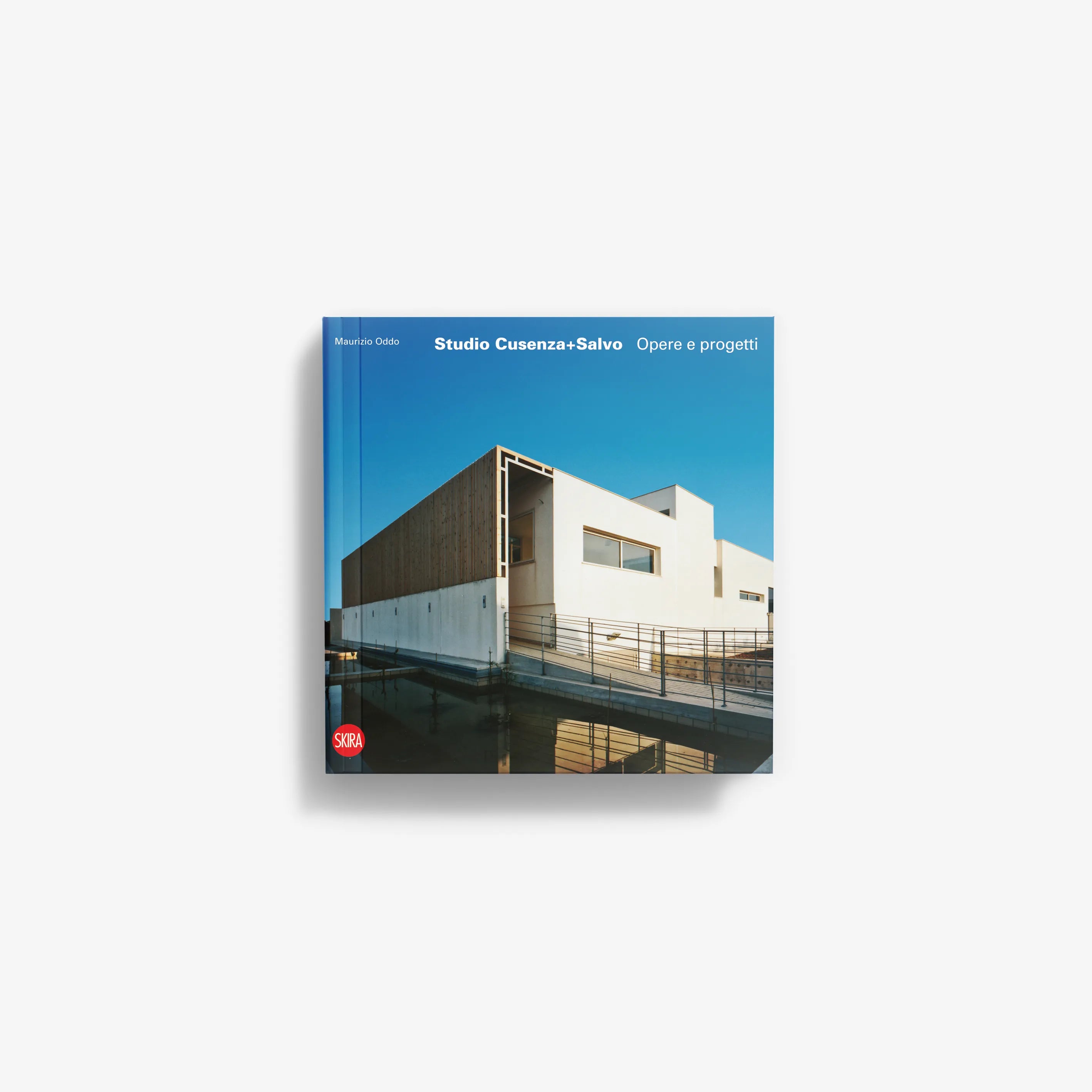 Architectural book cover with modern building photo and blue title panel