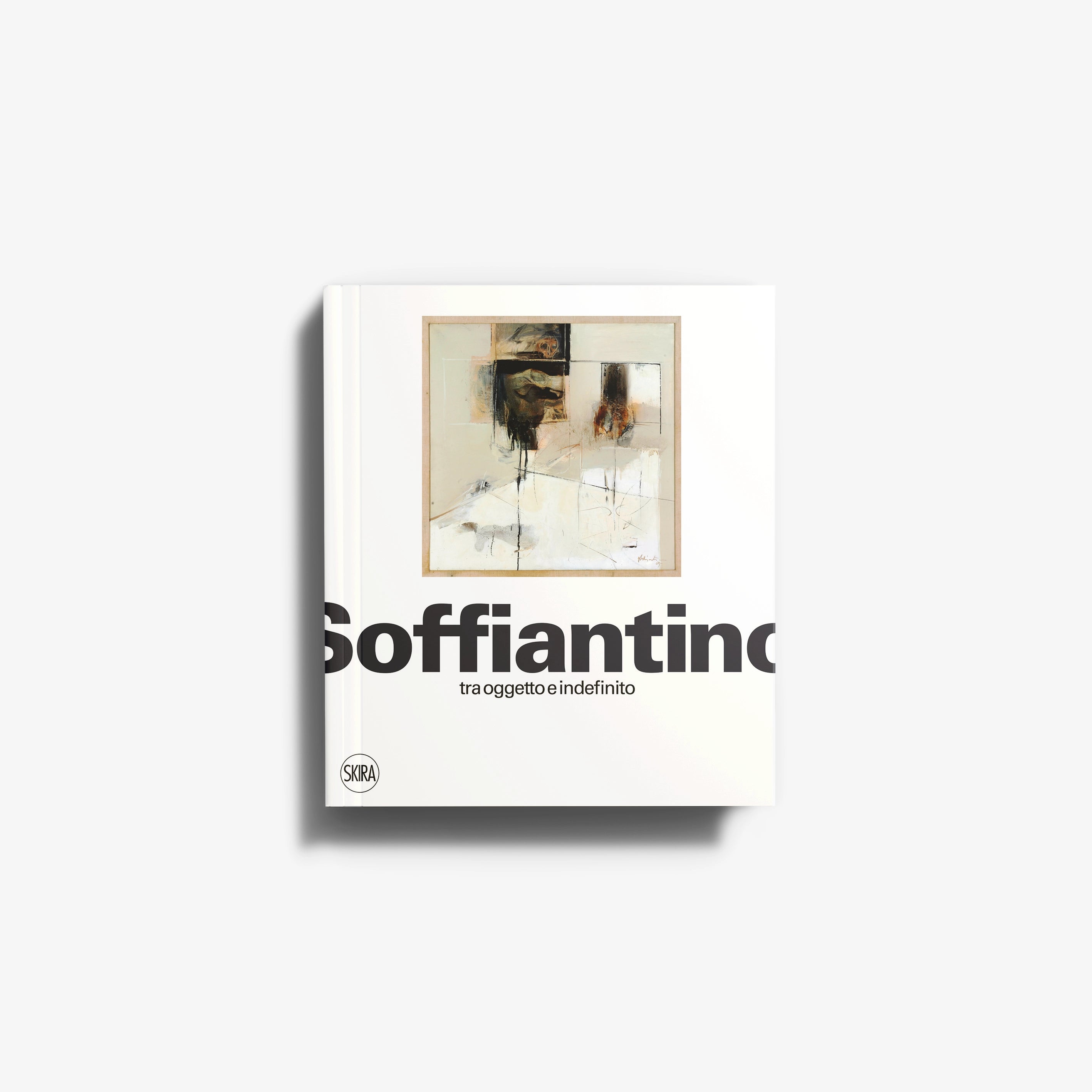 Contemporary art monograph by Skira Arte, Giacomo Soffiantino, with abstract framed artwork on a white cover