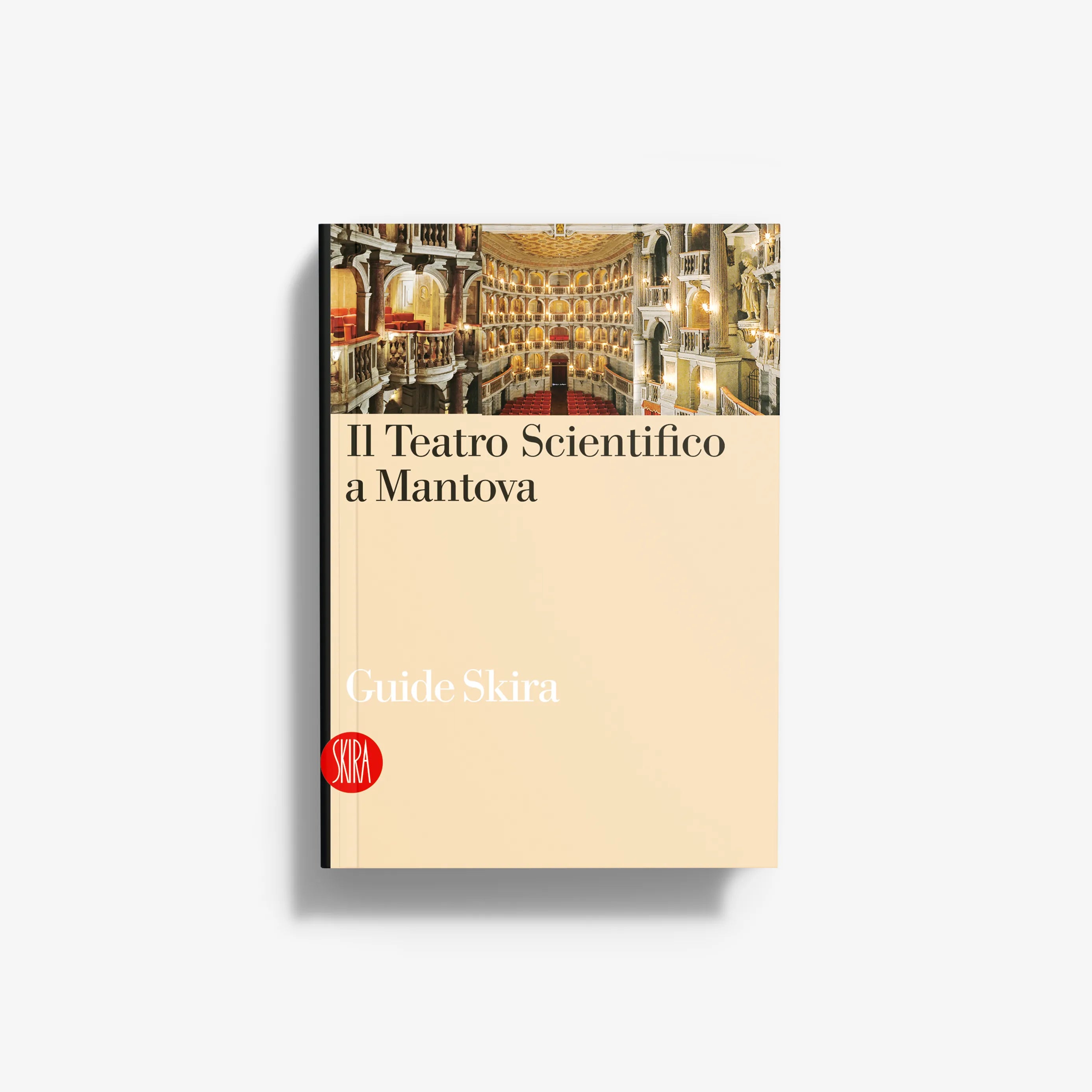 Travel guidebook with ornate theater photo and beige cover, softcover