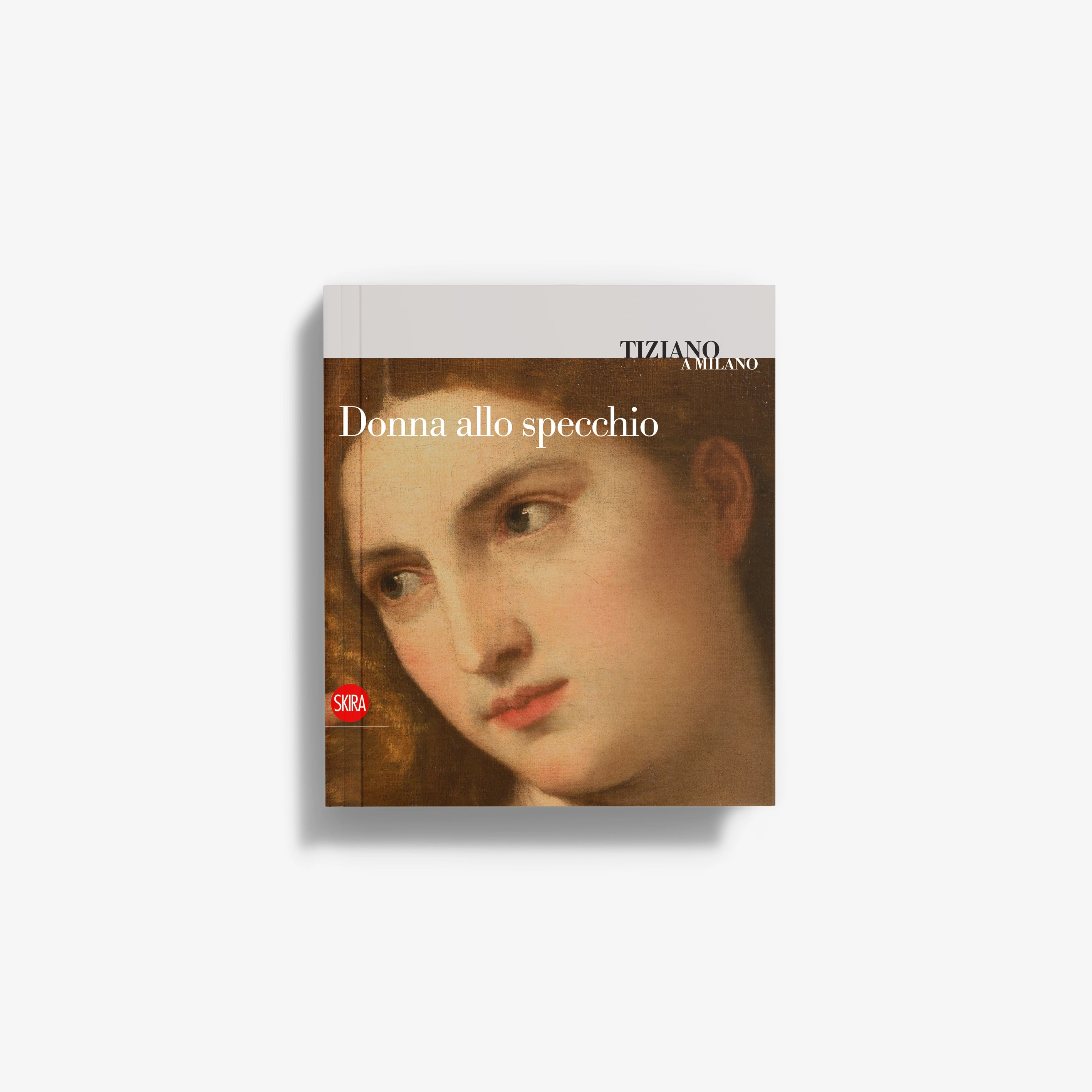 Art book cover with woman's portrait face, Tiziano Milano text