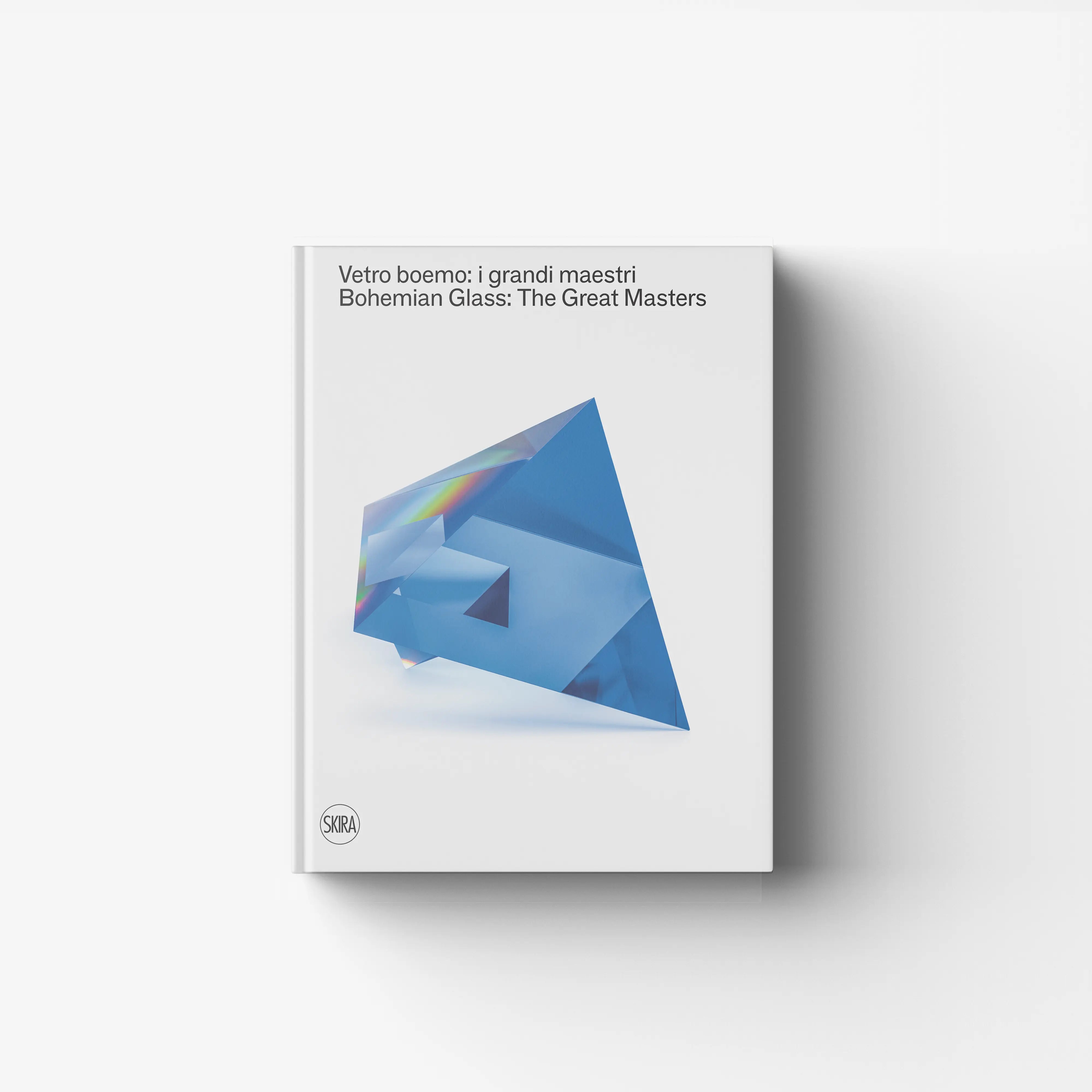 Art book in glass by Skira Arte with blue cover and reflective geometric artwork, featuring six contemporary glass sculptors