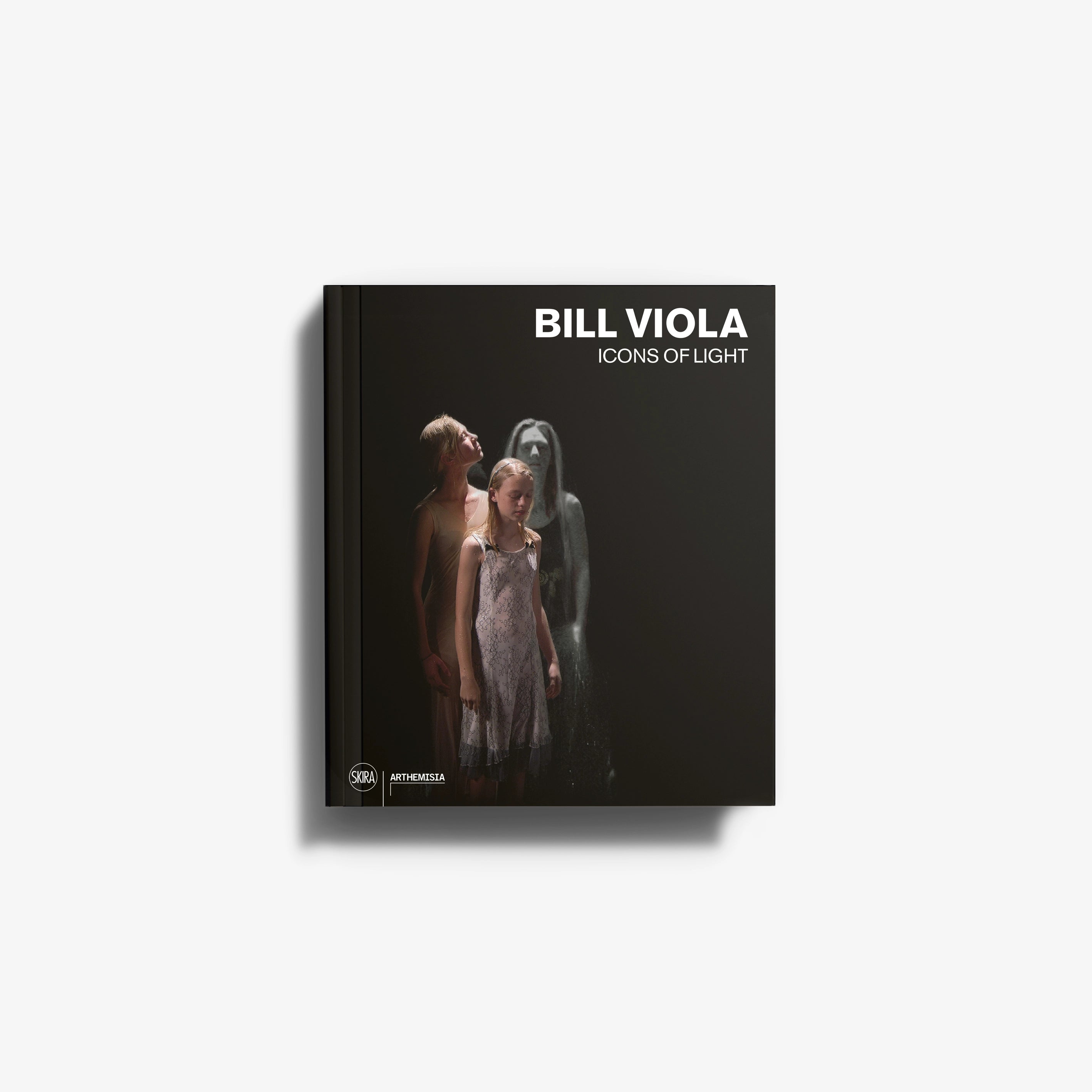 Contemporary art monograph Bill Viola Icons of Light by Skira Arte, black cover with figures and title text