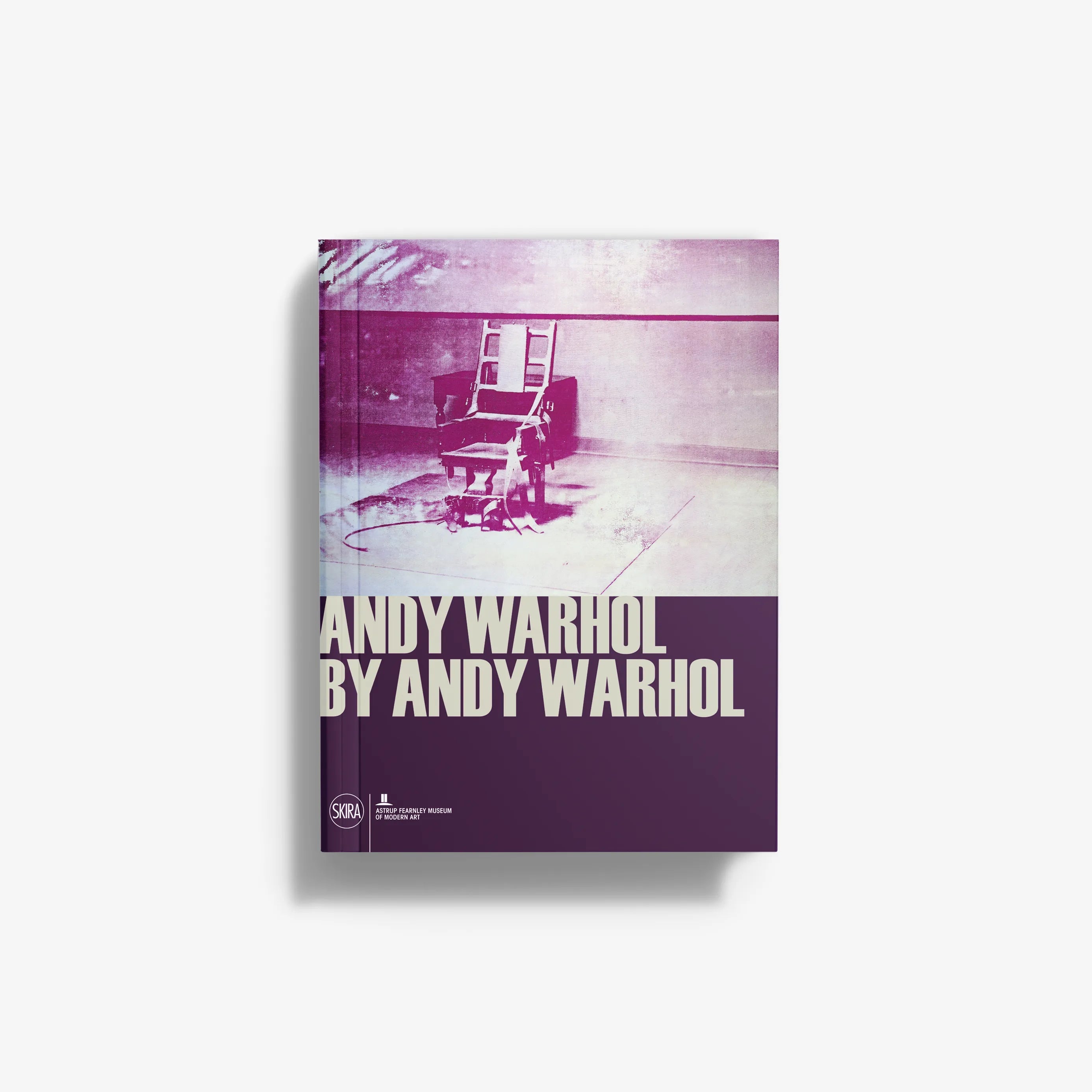 Purple and white exhibition guide book with Andy Warhol title text on cover