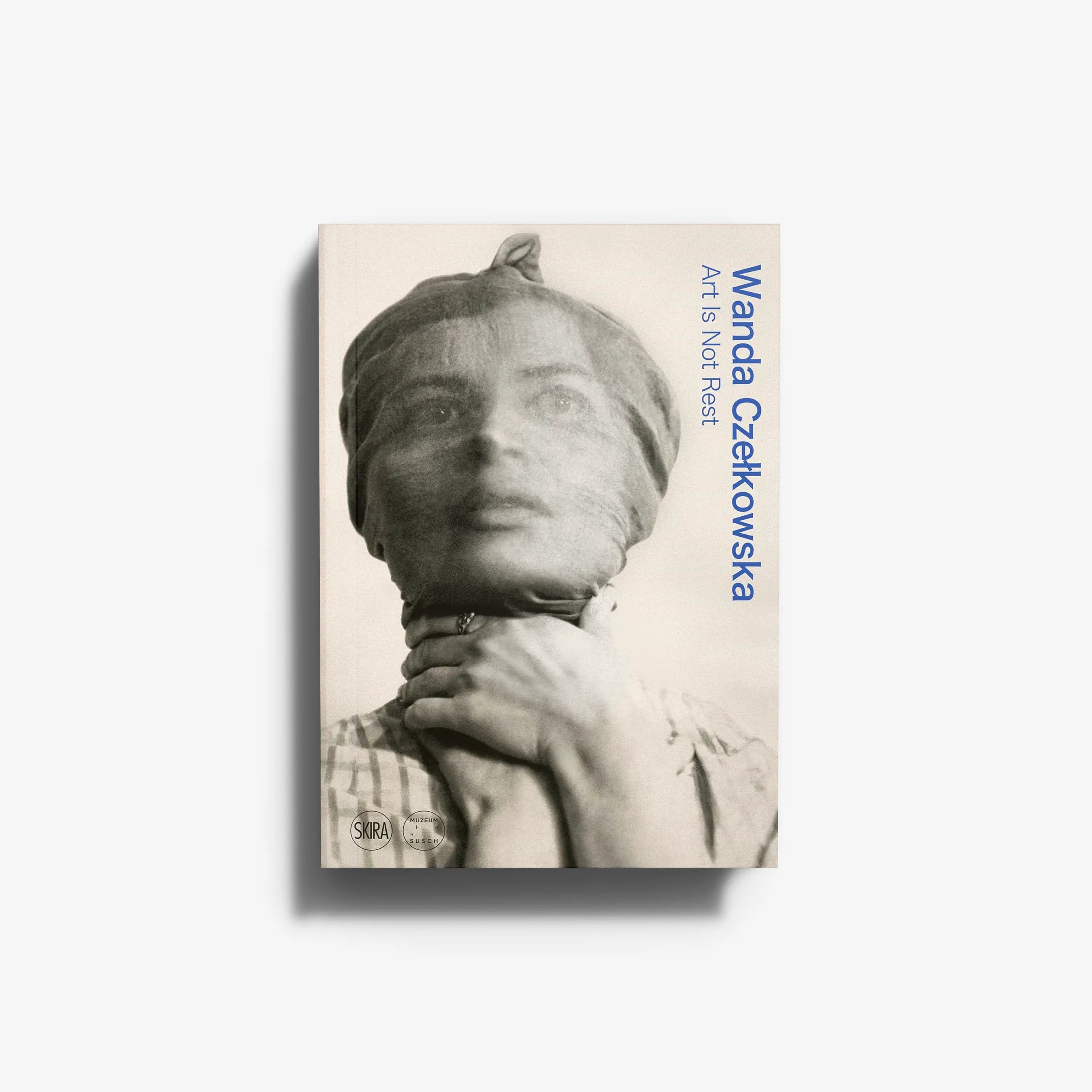 Contemporary art bookcatalog in cream with grey abstracted bust, Skira Arte, Polish avant-garde artist Wanda Czelkowska