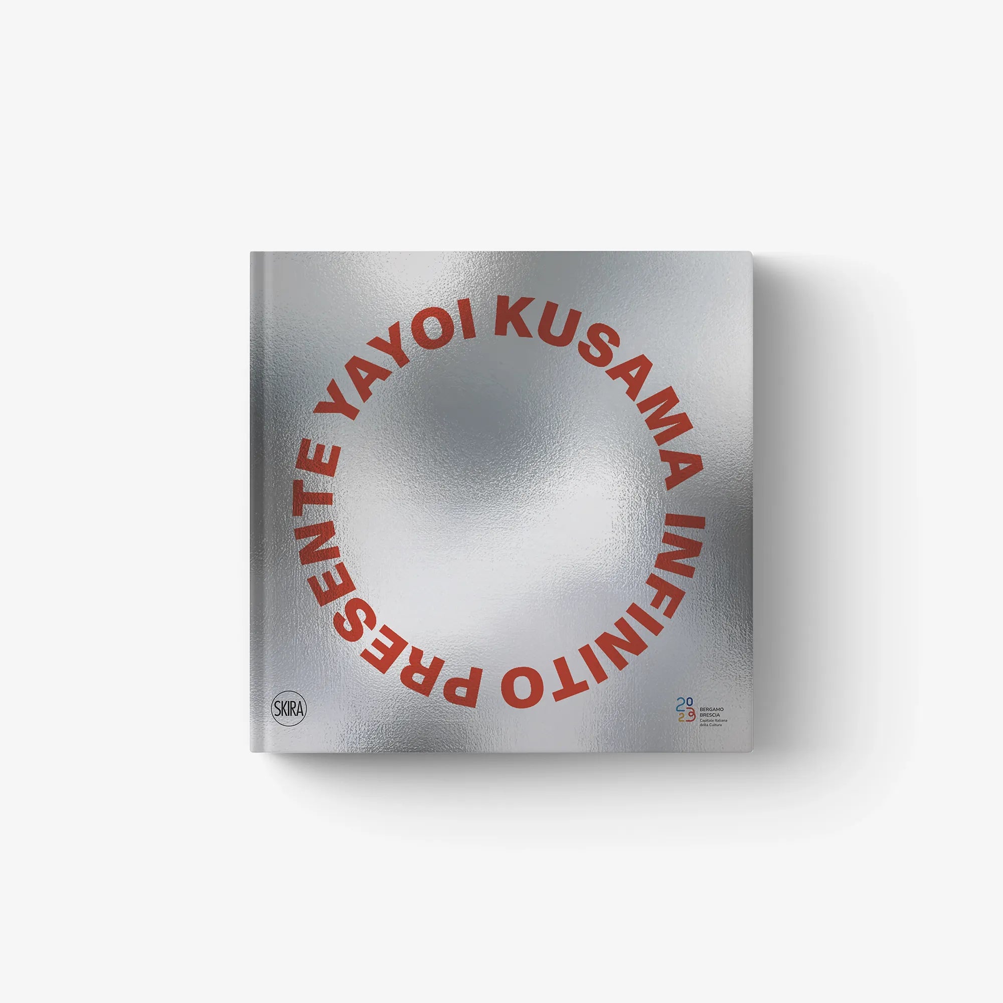 Yayoi Kusama art book cover, gray with red circular typographic design