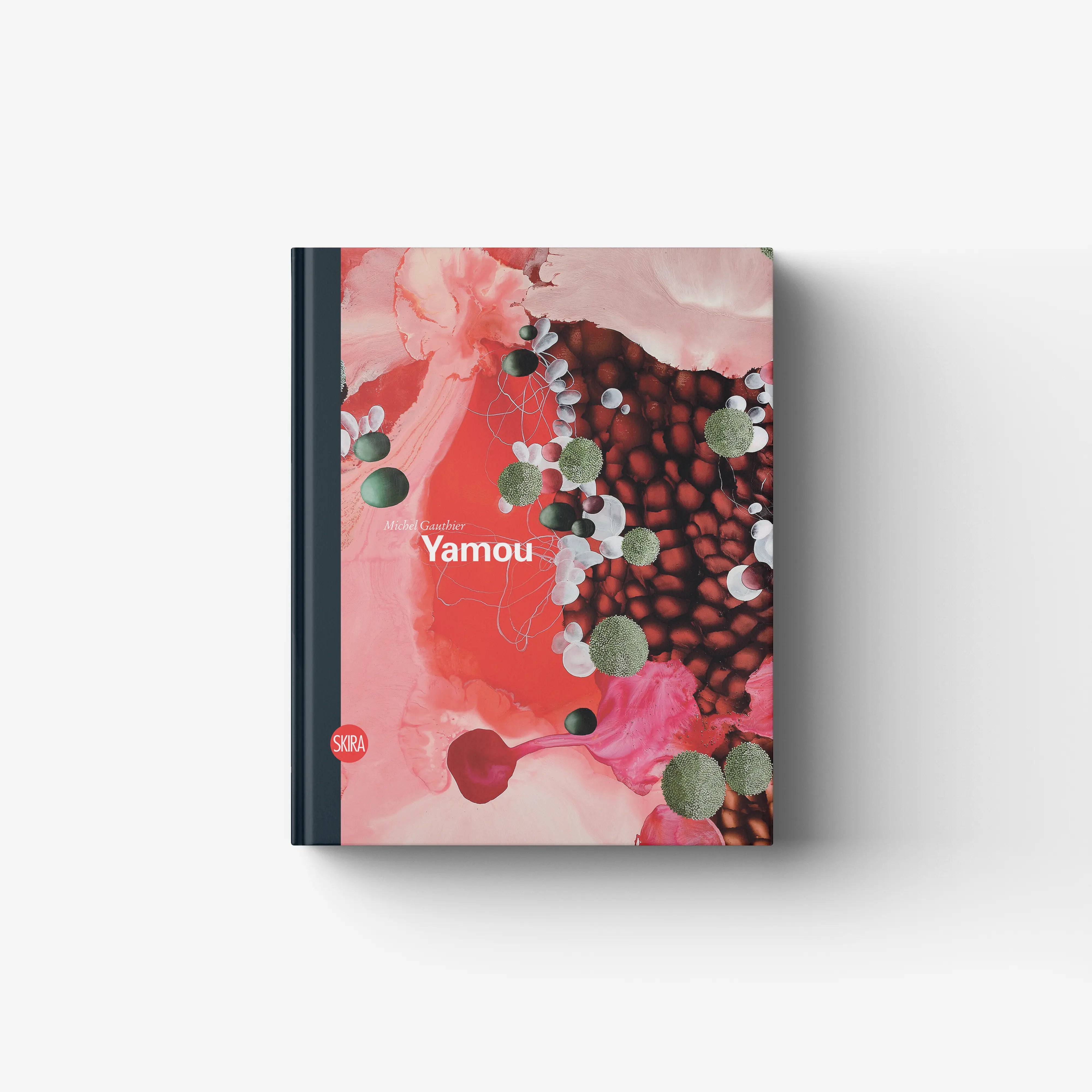 Pink abstract book cover with circular artwork and title text 'Yamou'