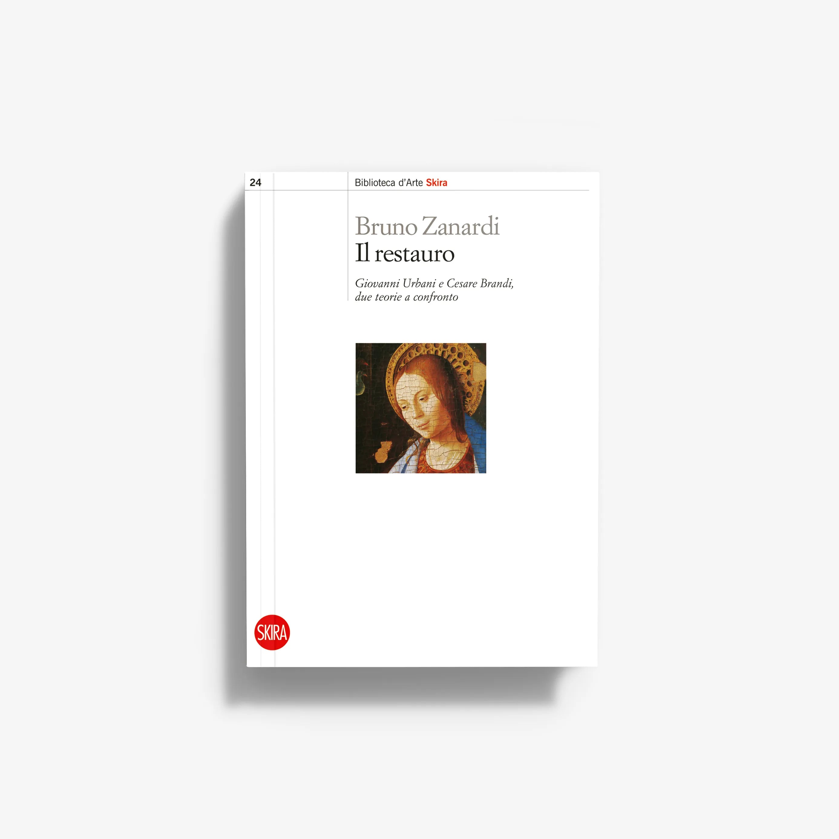 The restoration book with white cover, title text, and small painted portrait